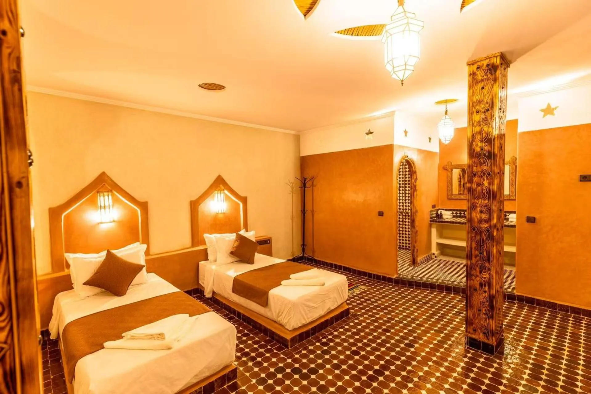 Bed in Hotel Sunset Palace