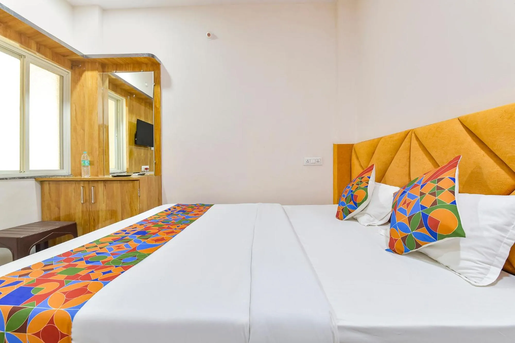 Bed in FabHotel Somnath