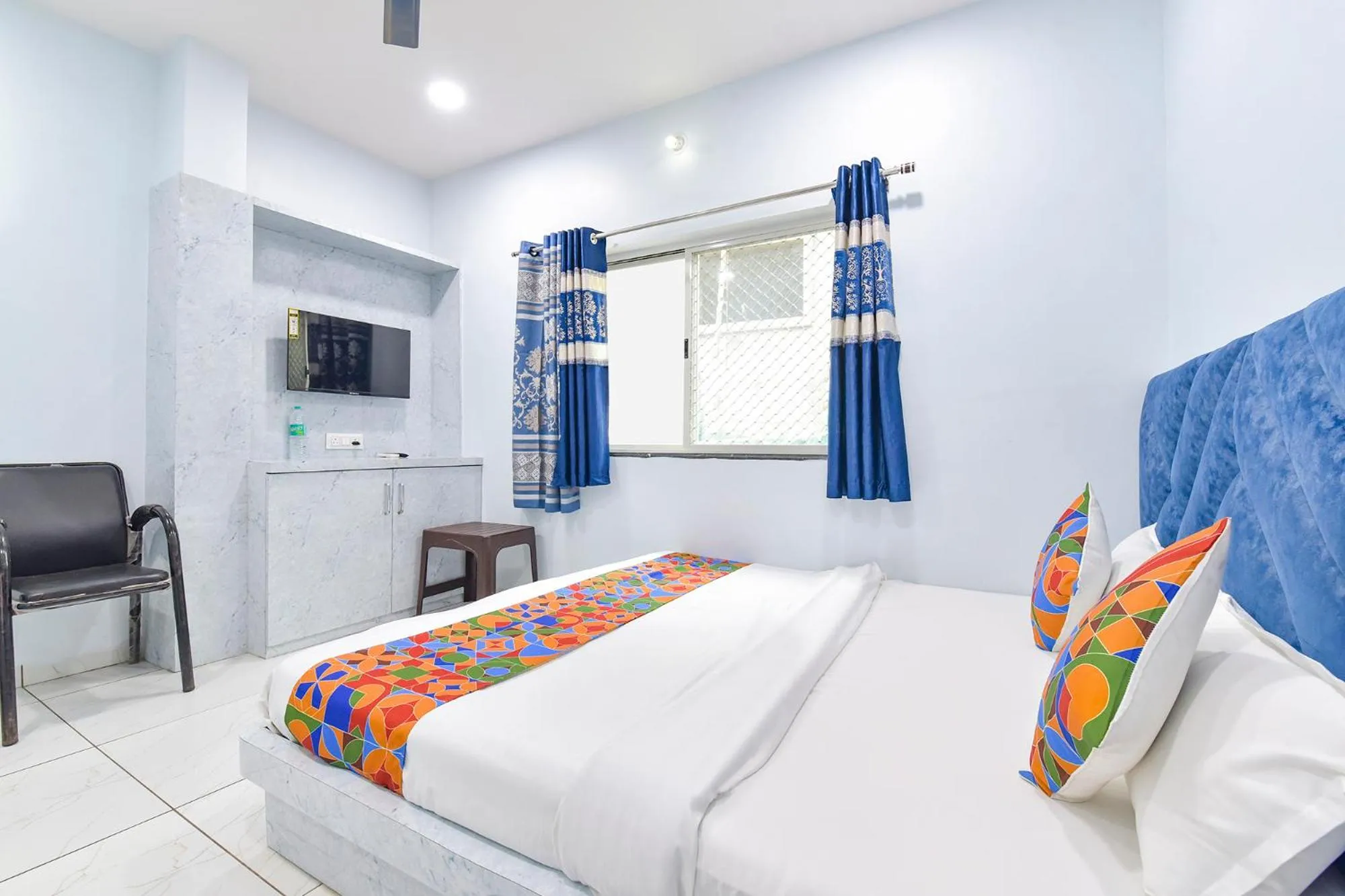 Bed in FabHotel Somnath