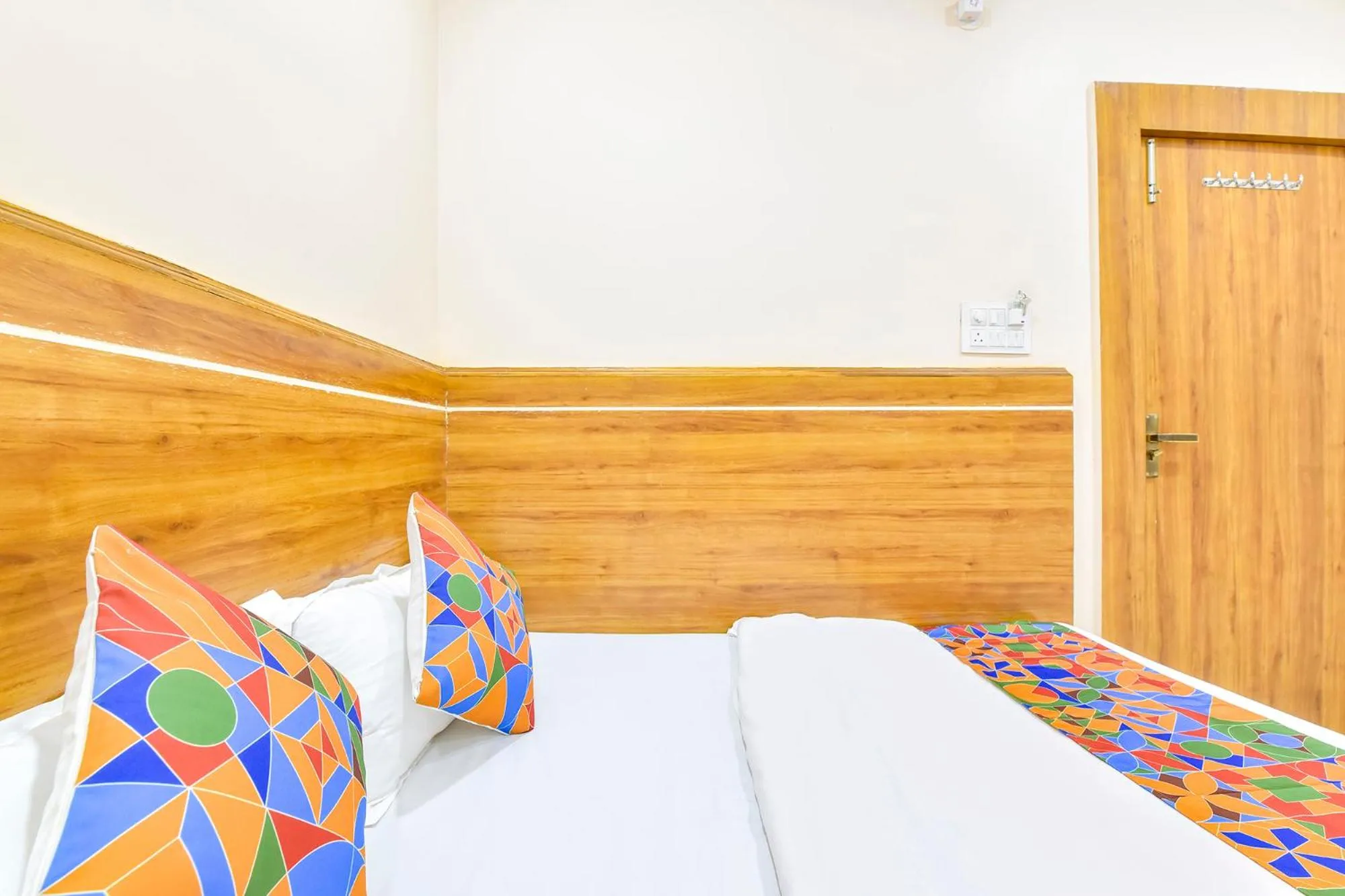 Bed in FabHotel Somnath