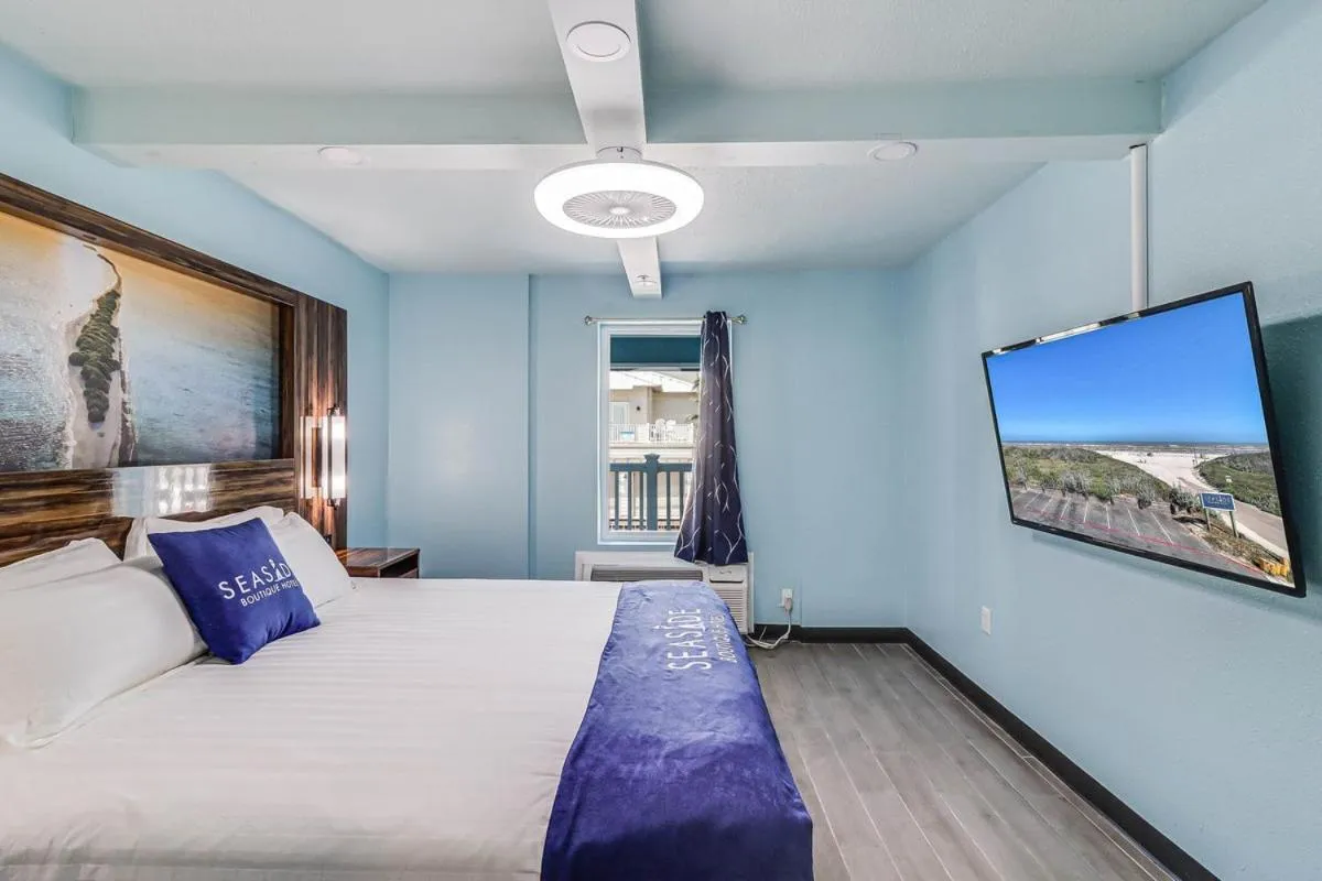 Bed in Seaside Boutique Hotel, Waves At Your Doorstep