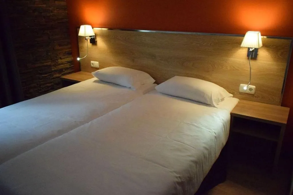 Bed in HOTEL VICTORIA