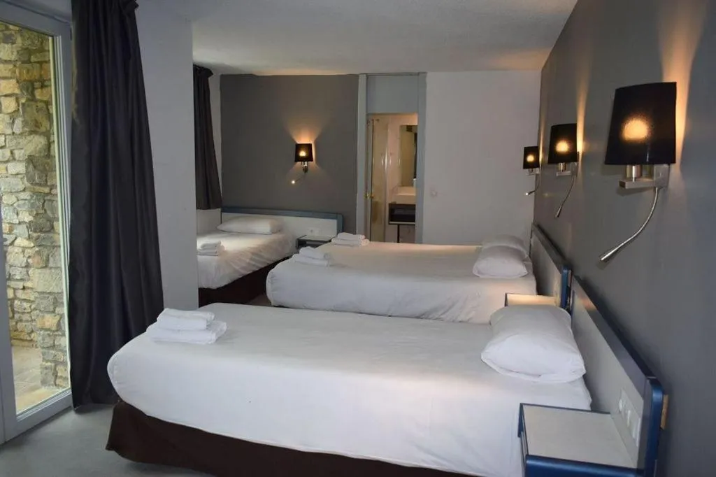 Bed in HOTEL VICTORIA