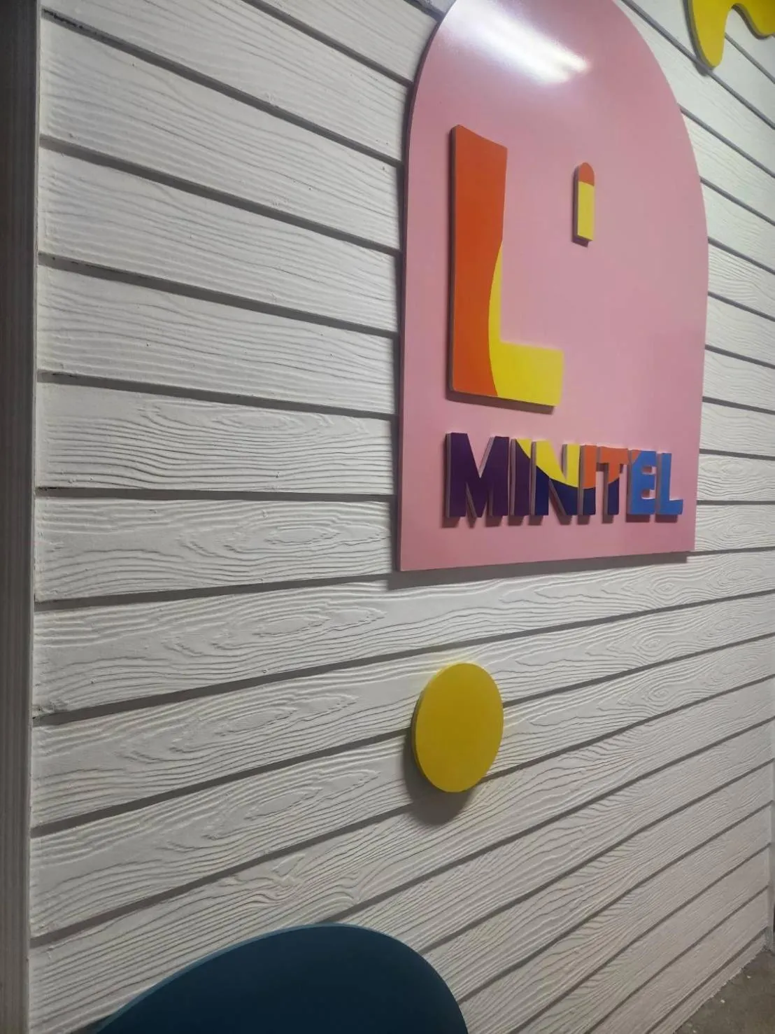 Property logo or sign in L MINITEL at Night Bazaar Chiangmai