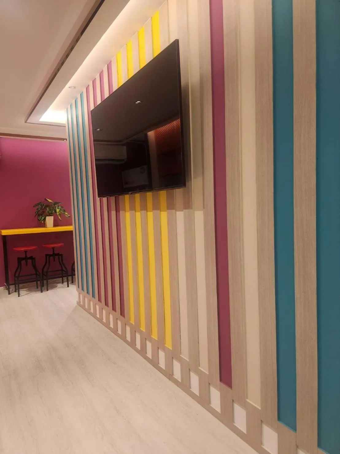 Communal lounge/ TV room in L MINITEL at Night Bazaar Chiangmai