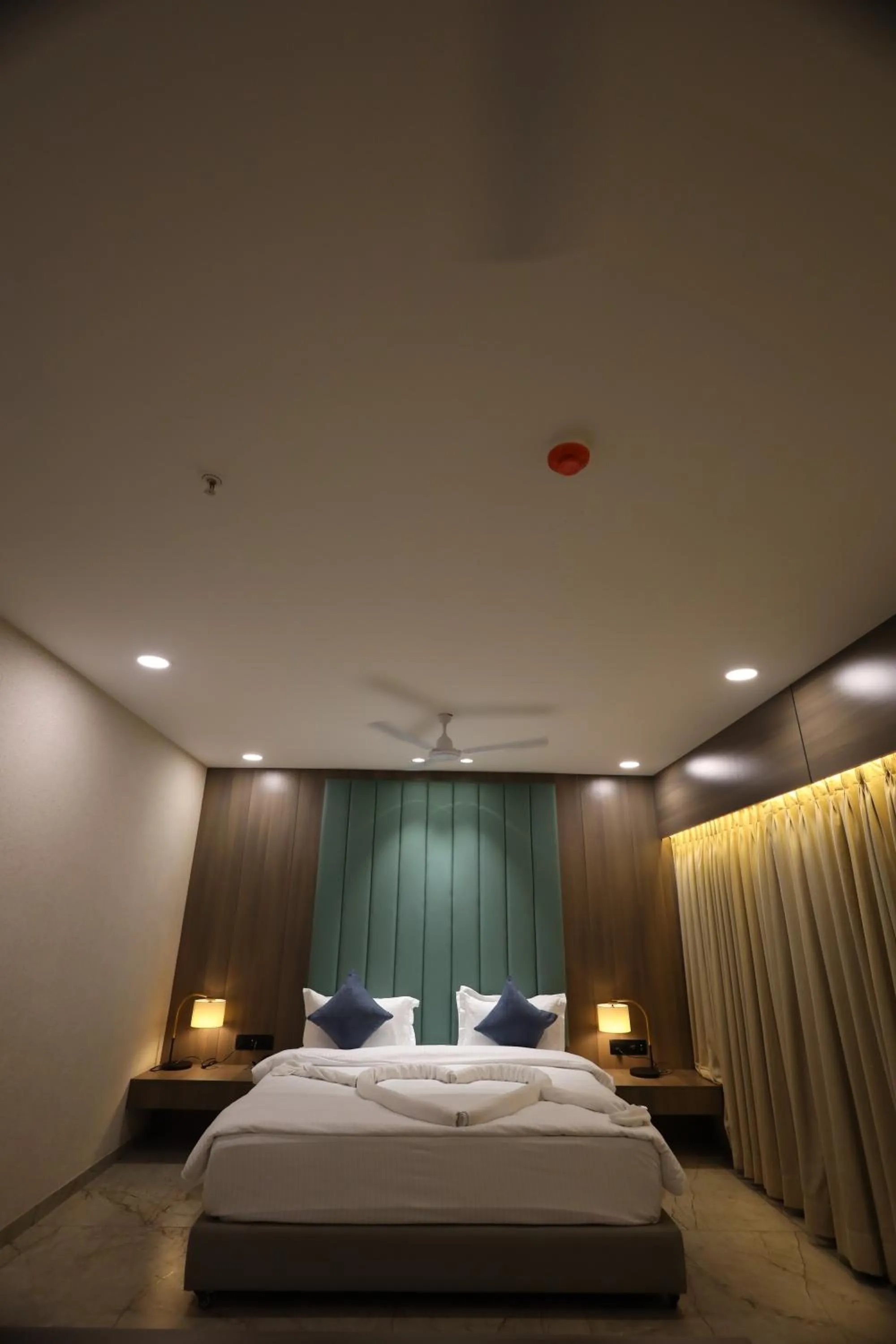 Bed in Lords Eco Inn Navsari