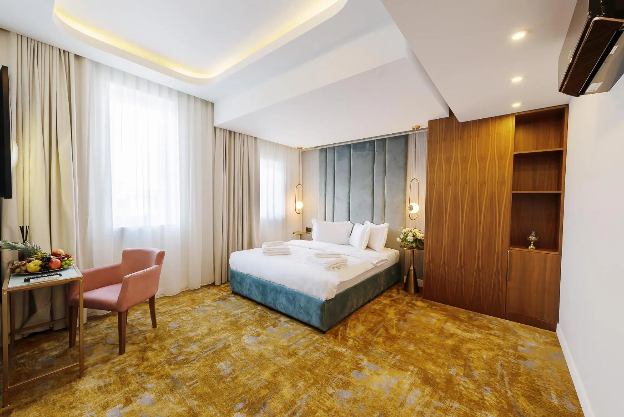 Bed in Yasu Luxury Rooms