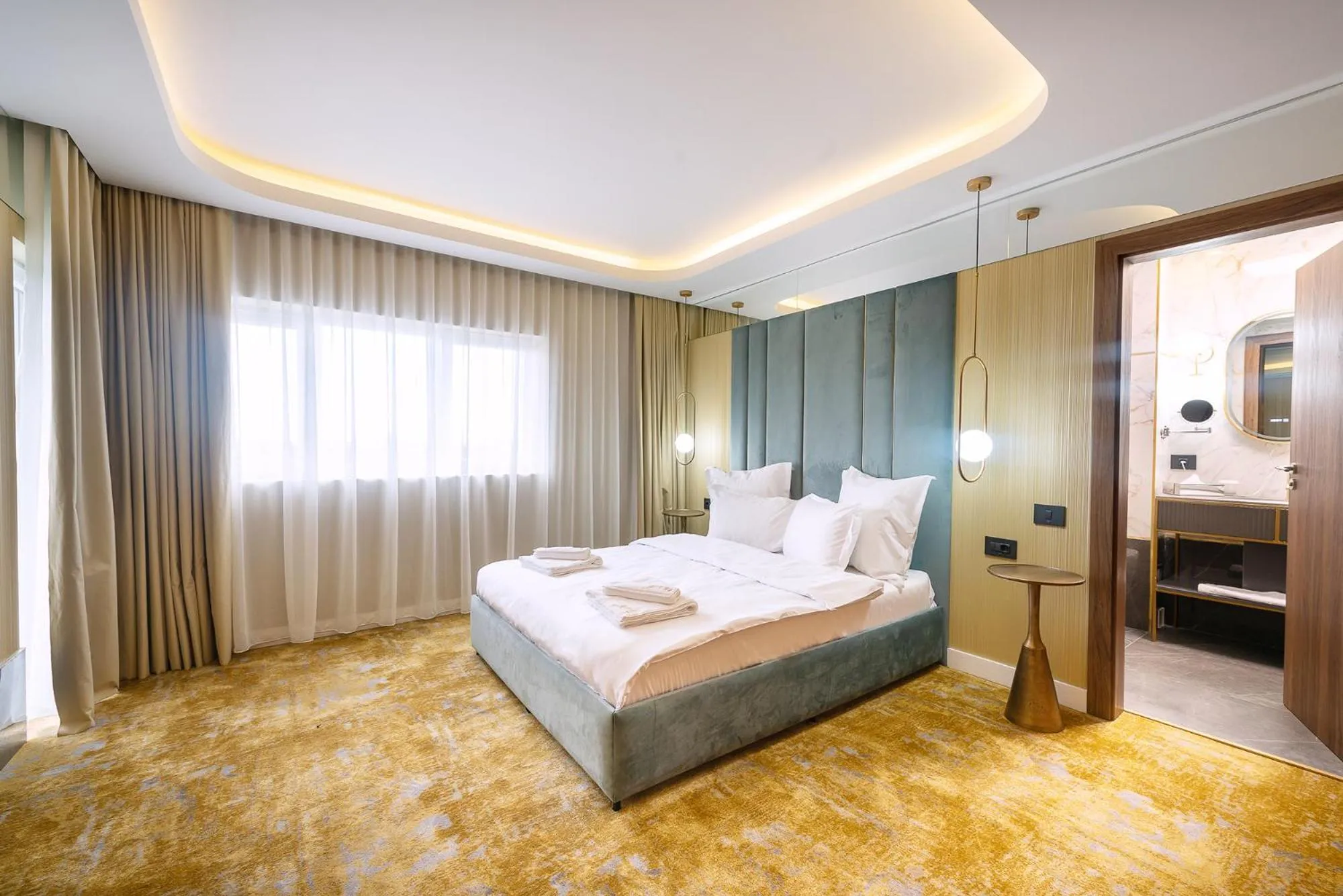 Bed in Yasu Luxury Rooms