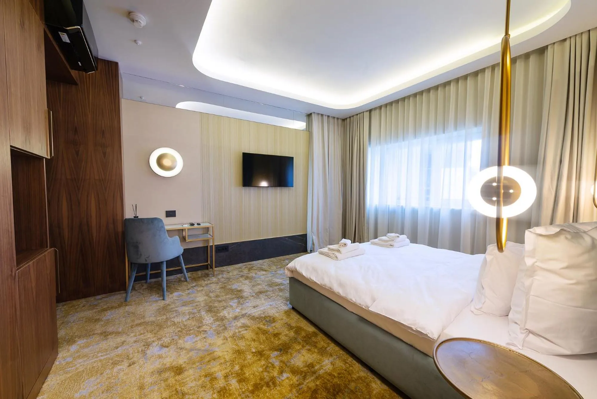 Bed in Yasu Luxury Rooms