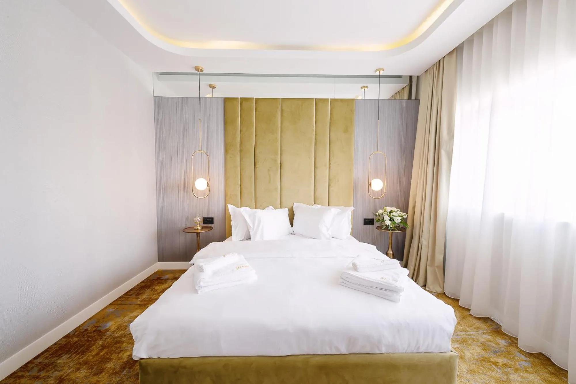 Bed in Yasu Luxury Rooms