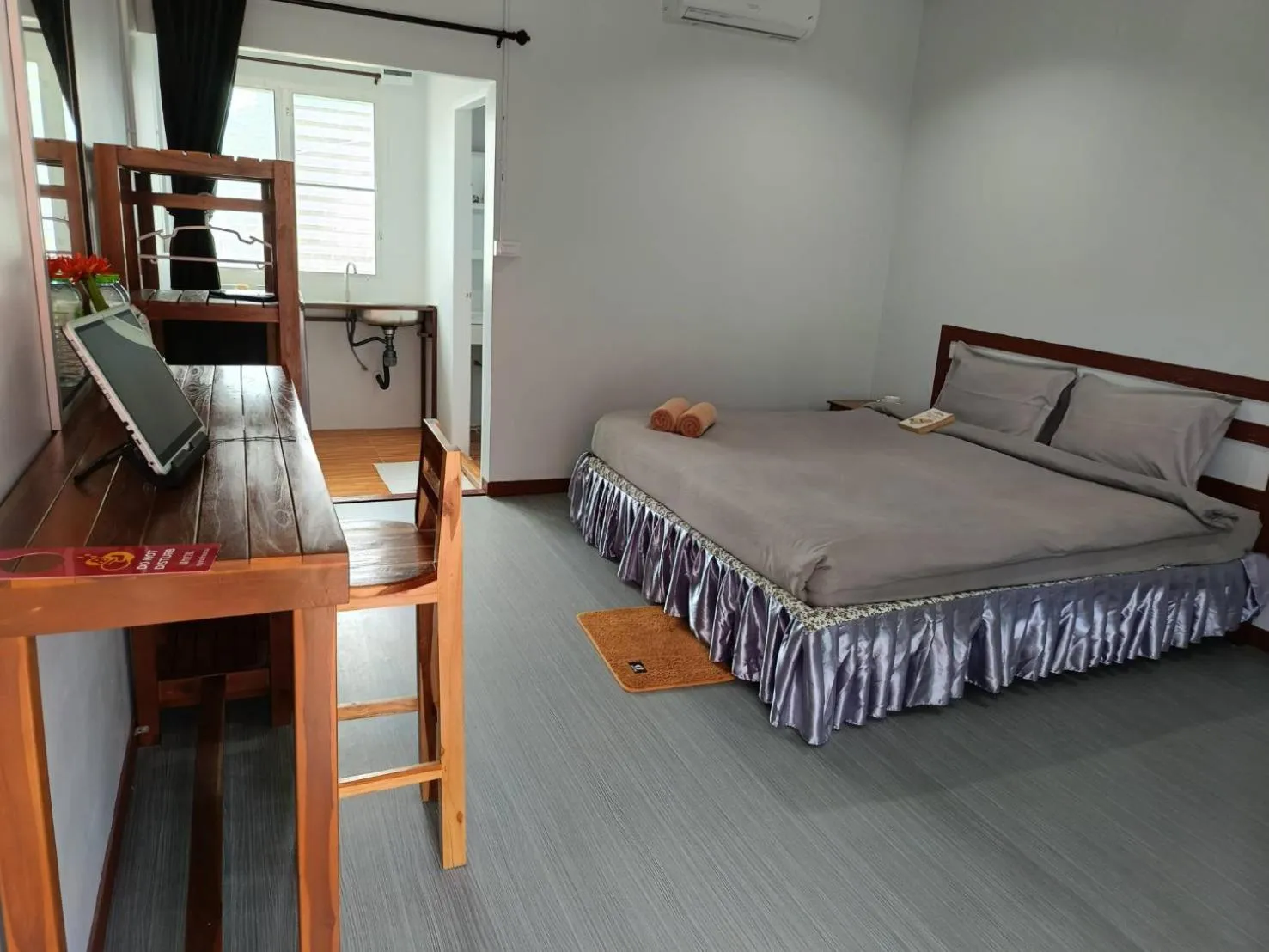 Bed in Lovely Paradise Phangan Hotel