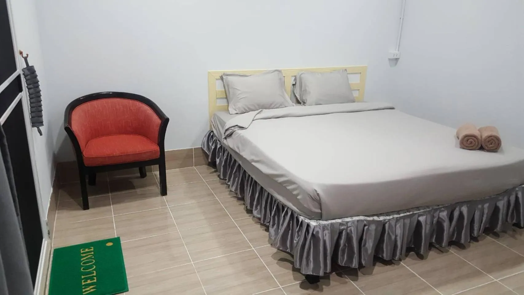 Bed in Lovely Paradise Phangan Hotel