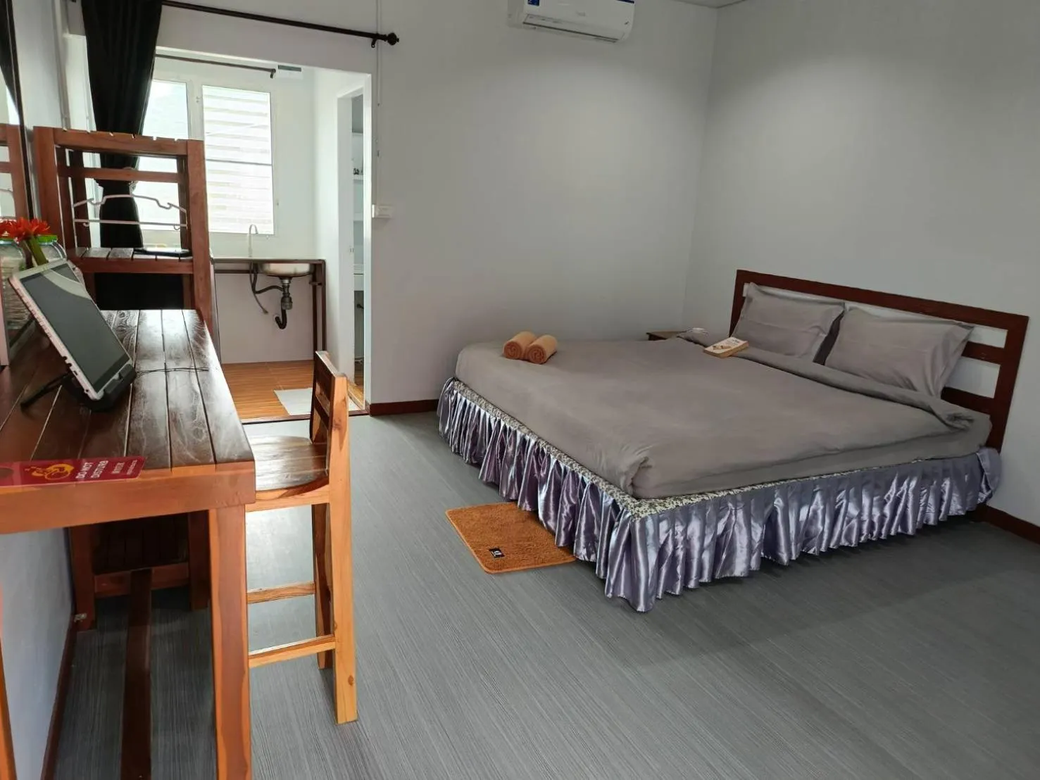 Bed in Lovely Paradise Phangan Hotel