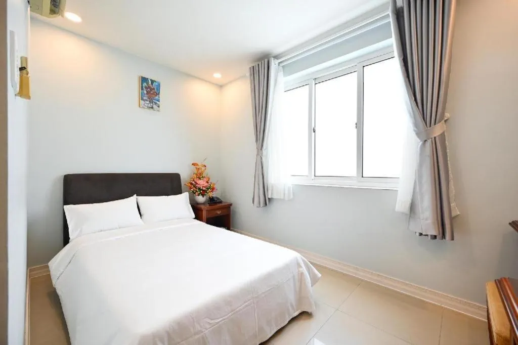 Bed in New Sunny 1 Hotel Q7 by BAY LUXURY