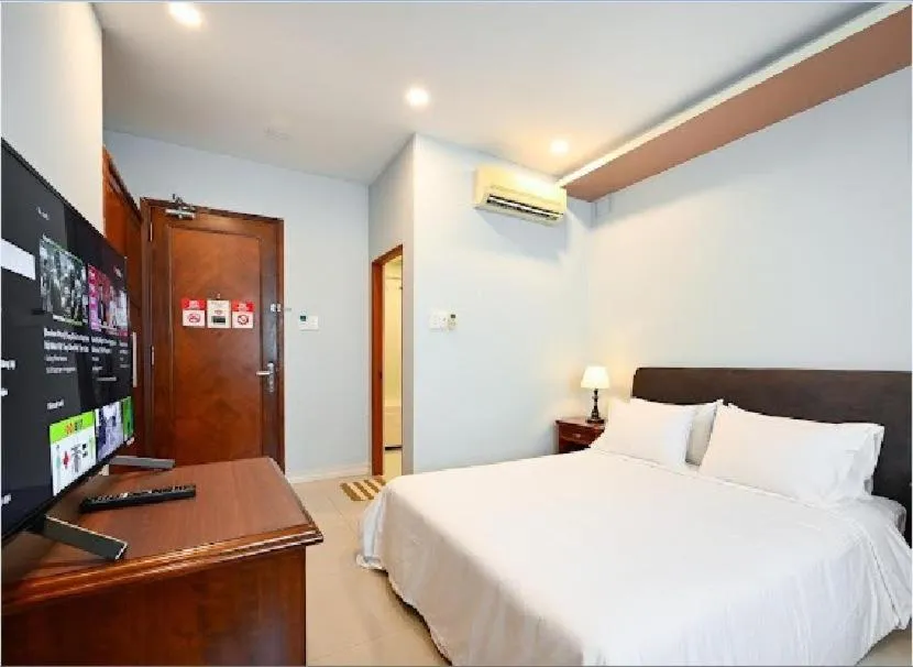 Bed in New Sunny 1 Hotel Q7 by BAY LUXURY