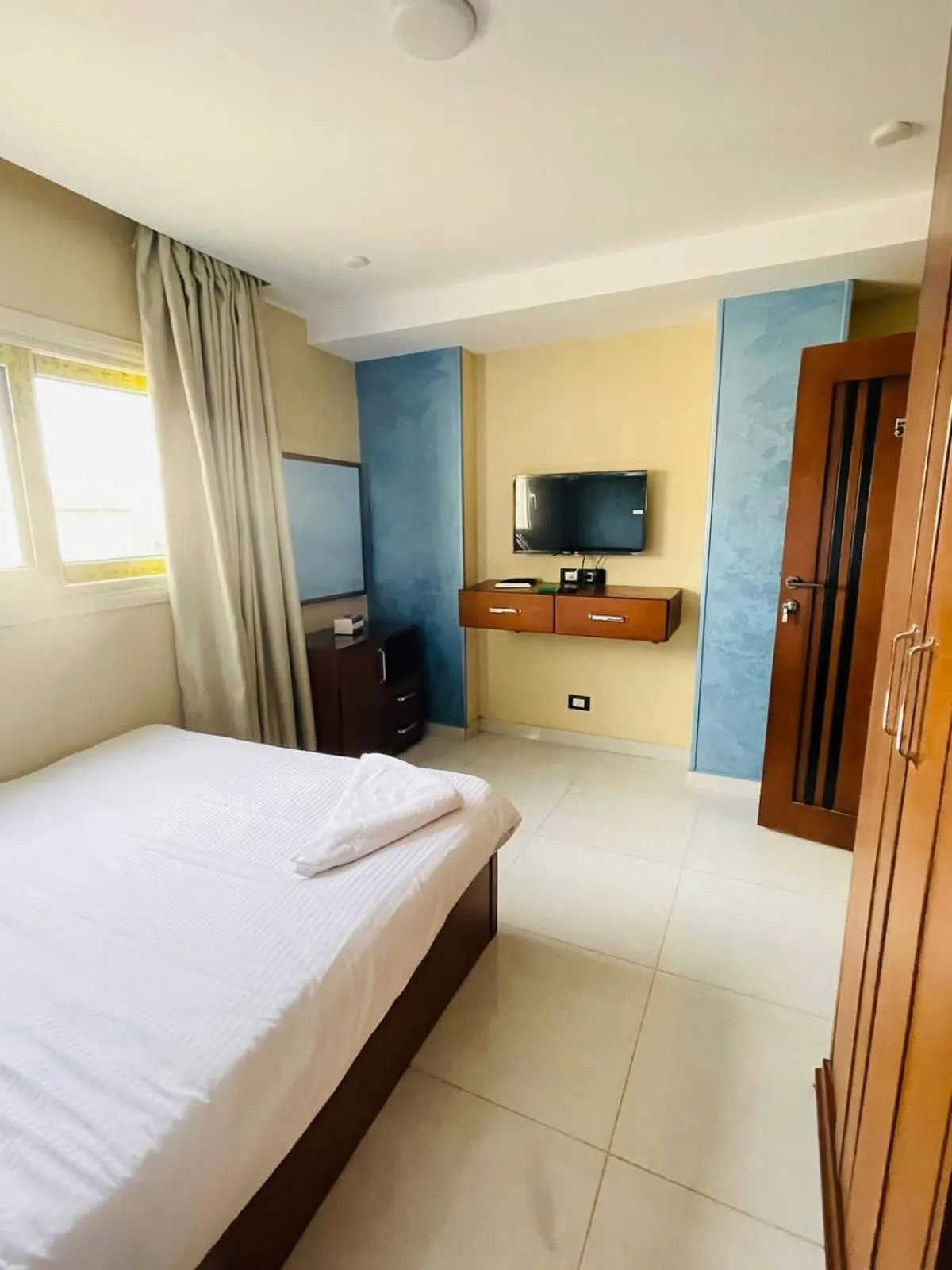 Communal lounge/ TV room, Bed in Grand Museum Pyramids View Hotel