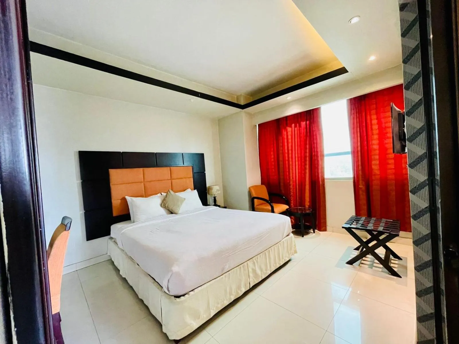 Bed in Orchid Business Hotel