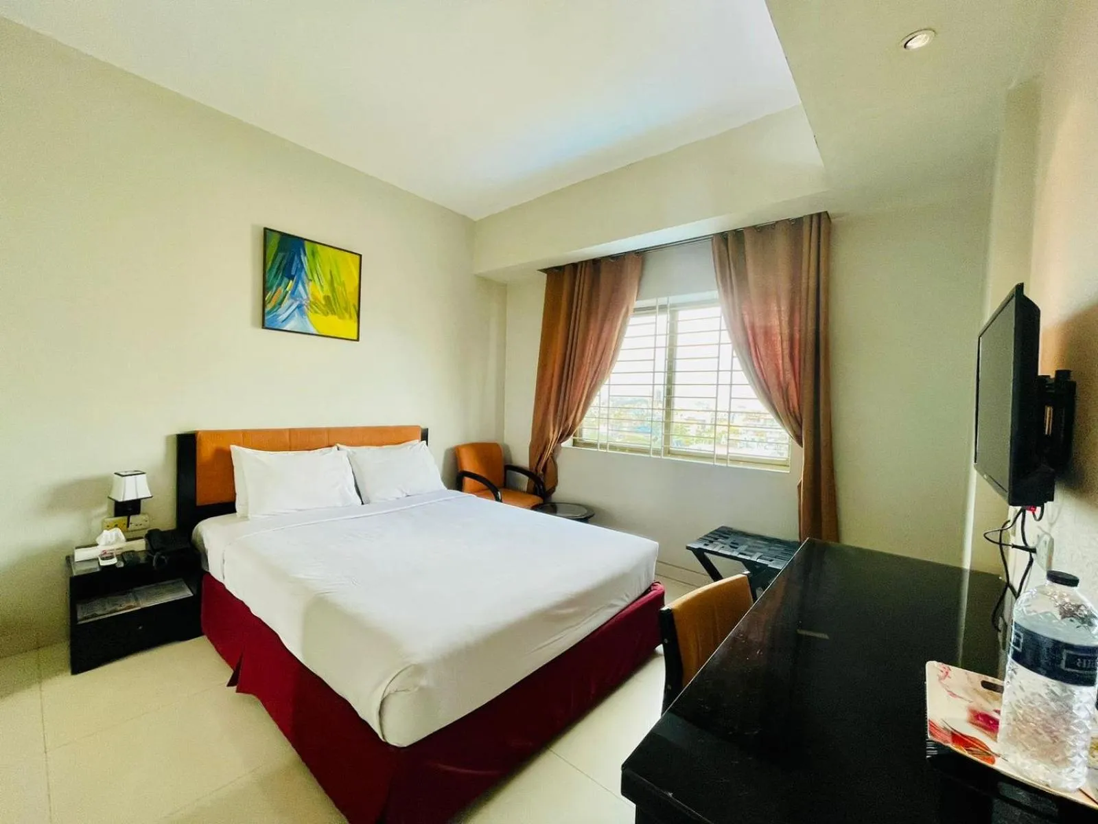 Bed in Orchid Business Hotel