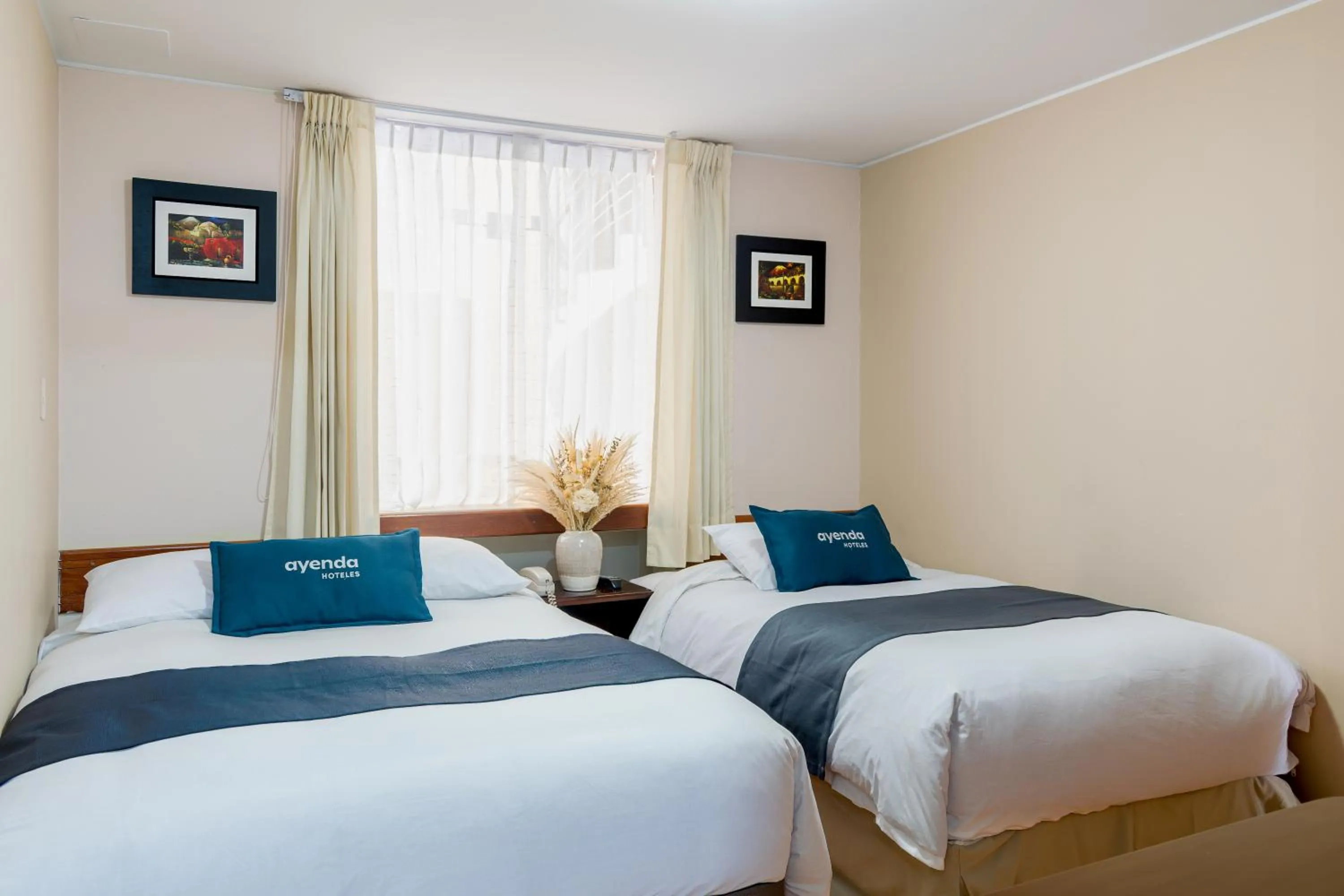 Bed in El puente Hotel Boutique