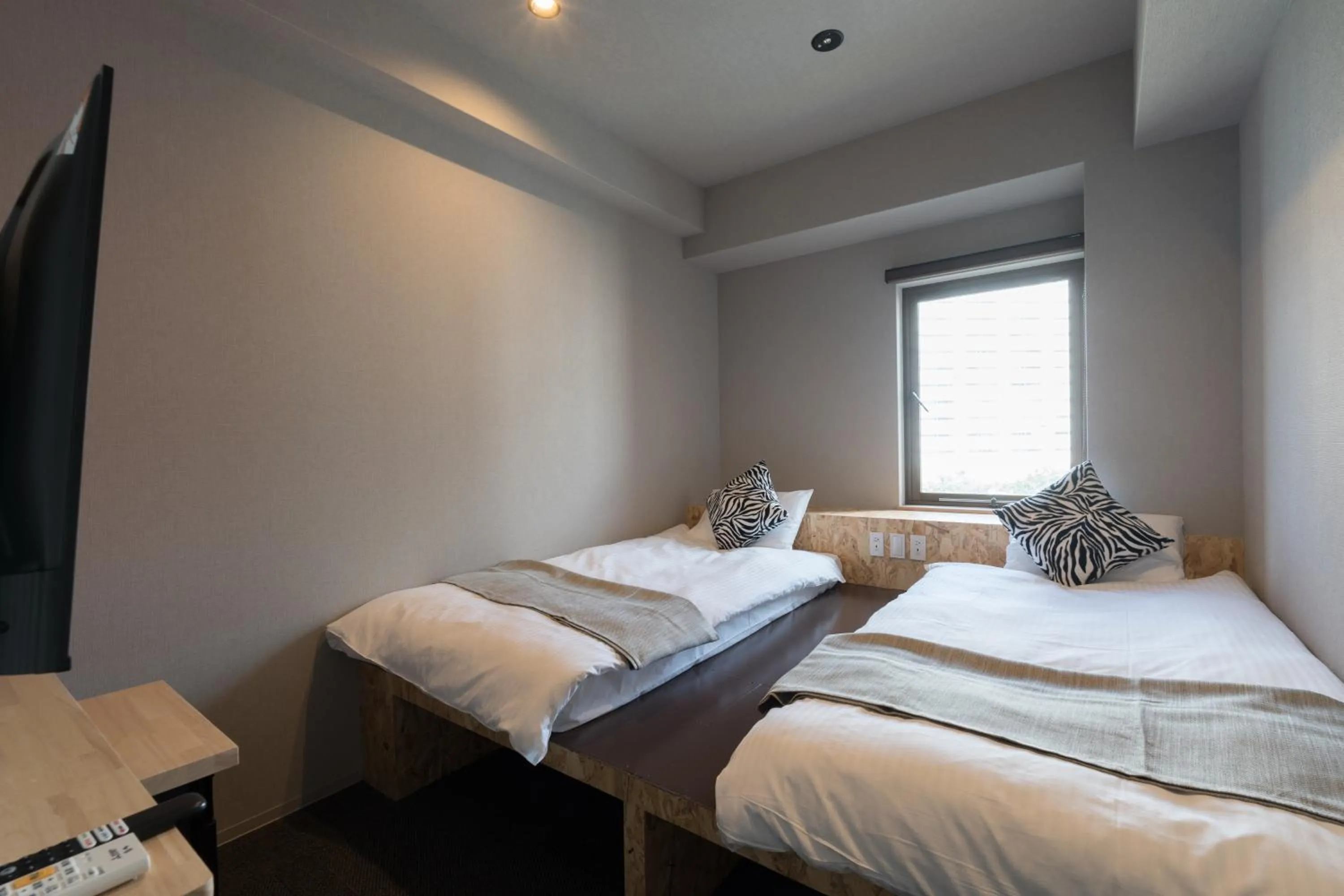 Bedroom, Bed in 3U NAMBA MINAMI - DOYANEN HOTELs