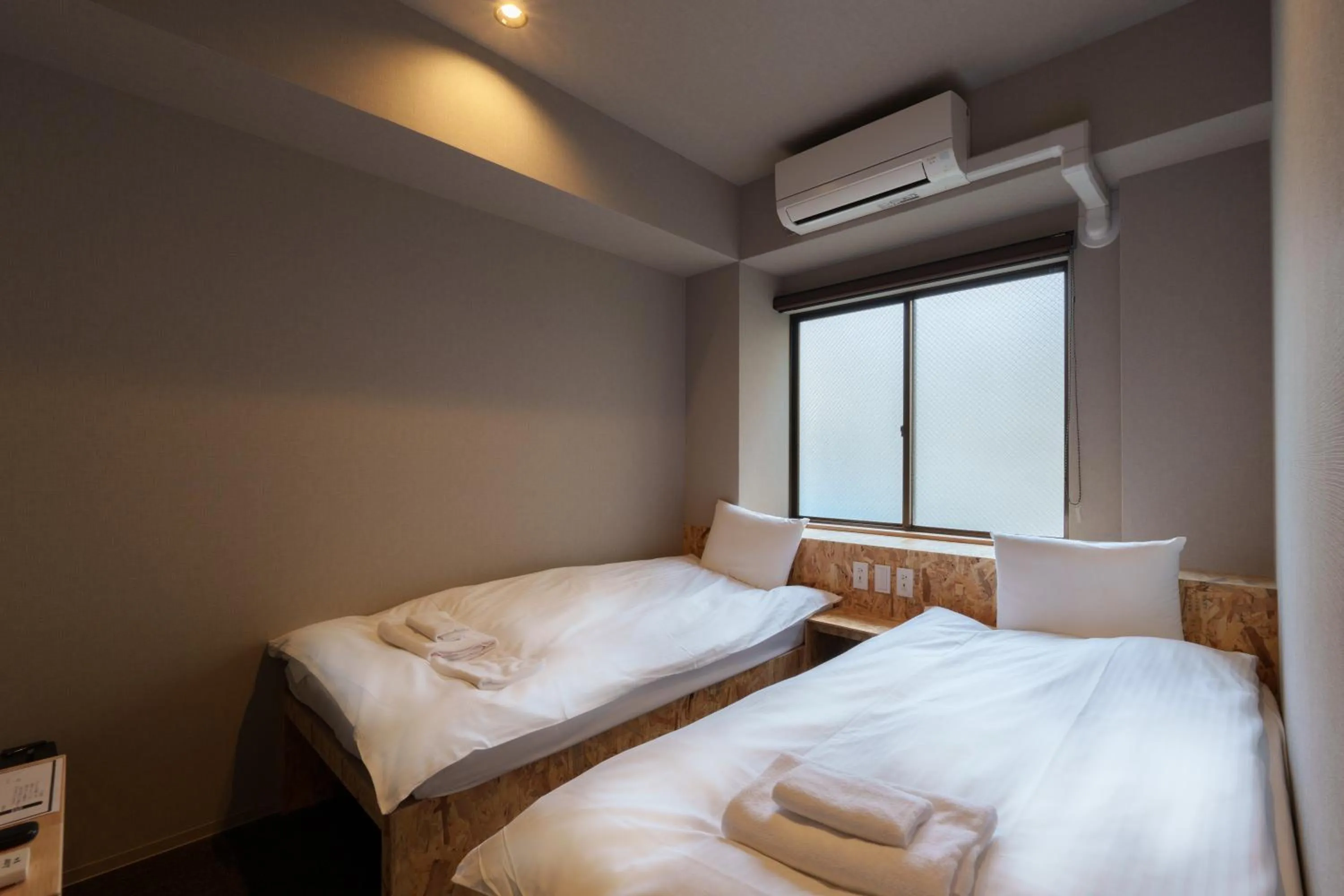 Bed in 3U NAMBA MINAMI - DOYANEN HOTELs