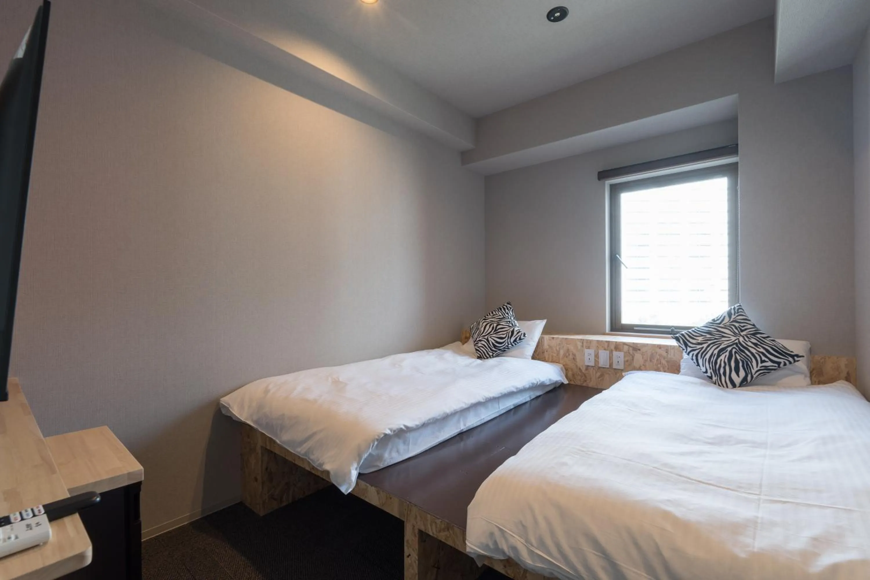 Bed in 3U NAMBA MINAMI - DOYANEN HOTELs