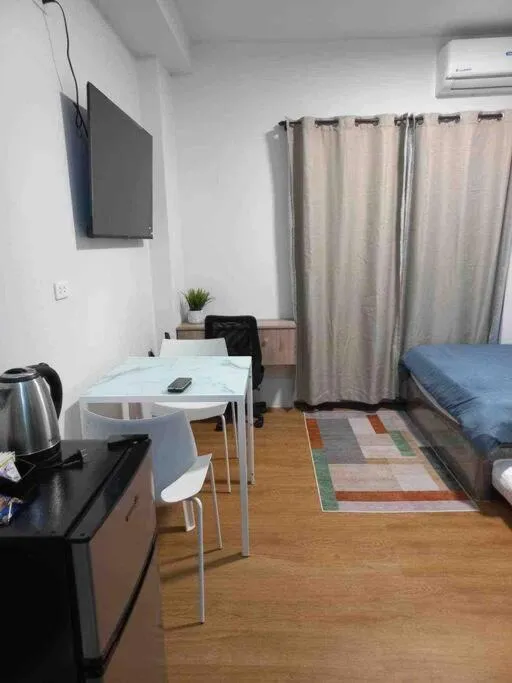 Bed in 6F Balcony View Studio Mesatierra Garden Residences