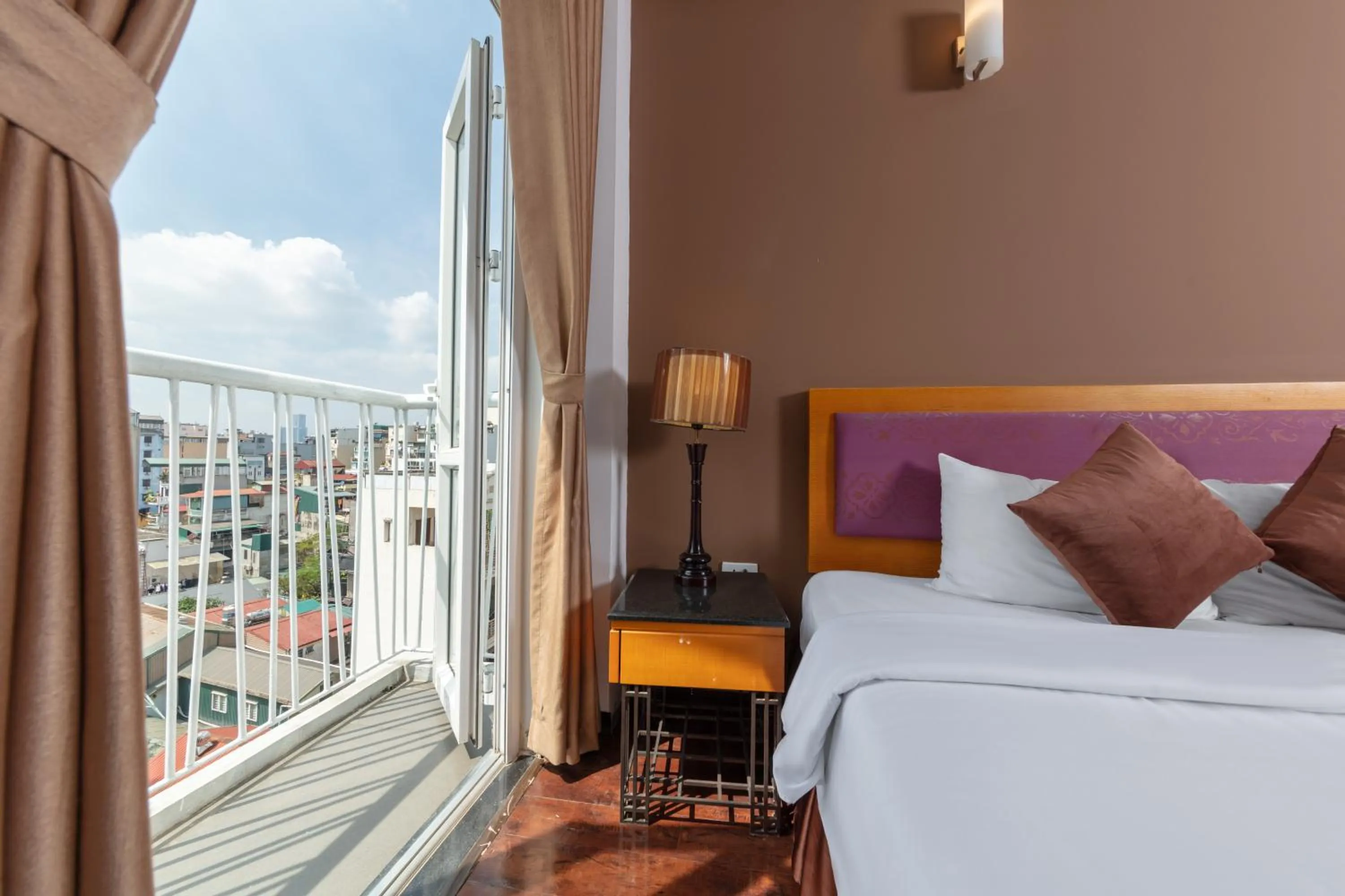 View (from property/room), Bed in Golden Sunshine Villa Hotel and Travel