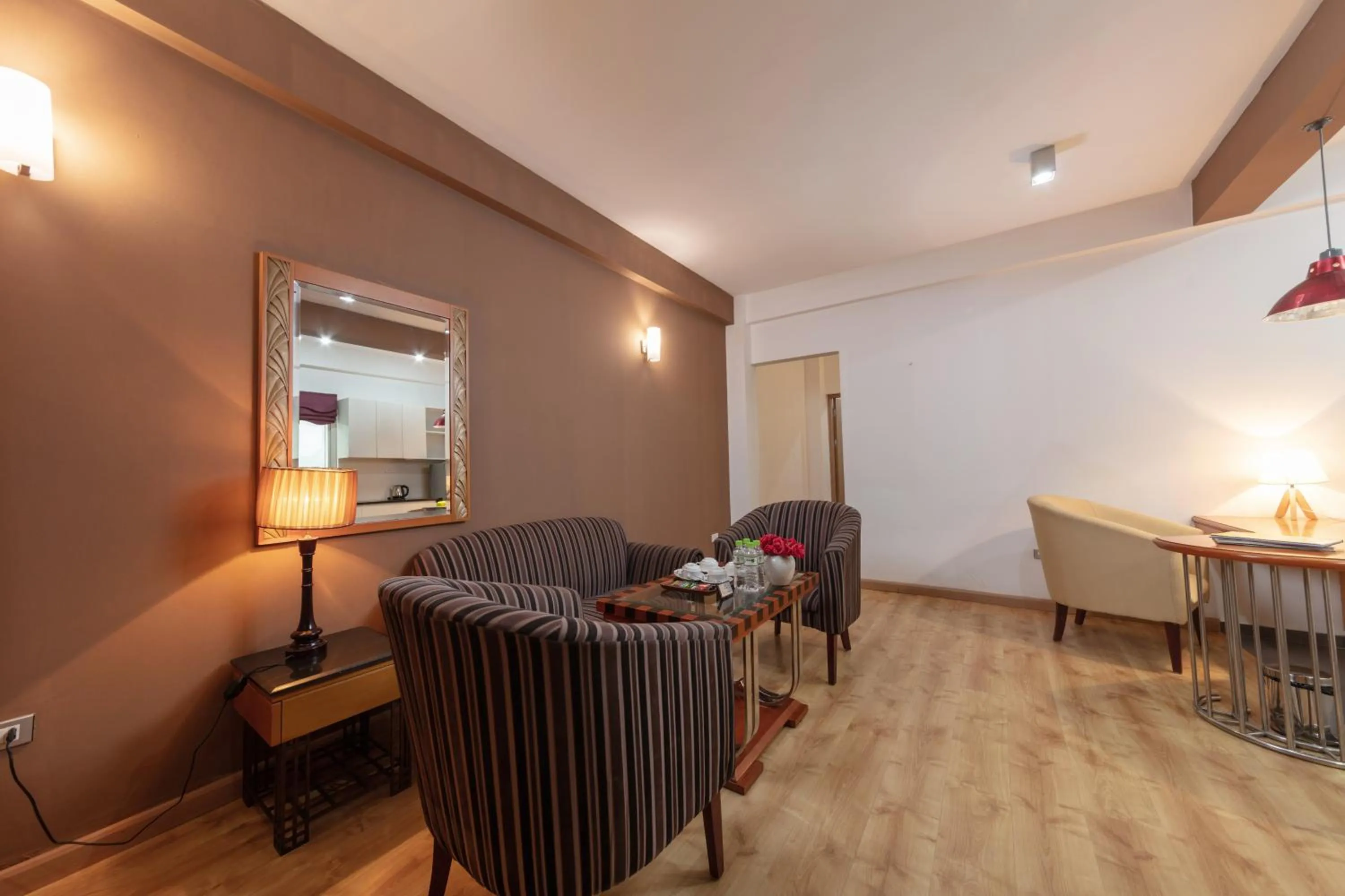 Living room in Golden Sunshine Villa Hotel and Travel