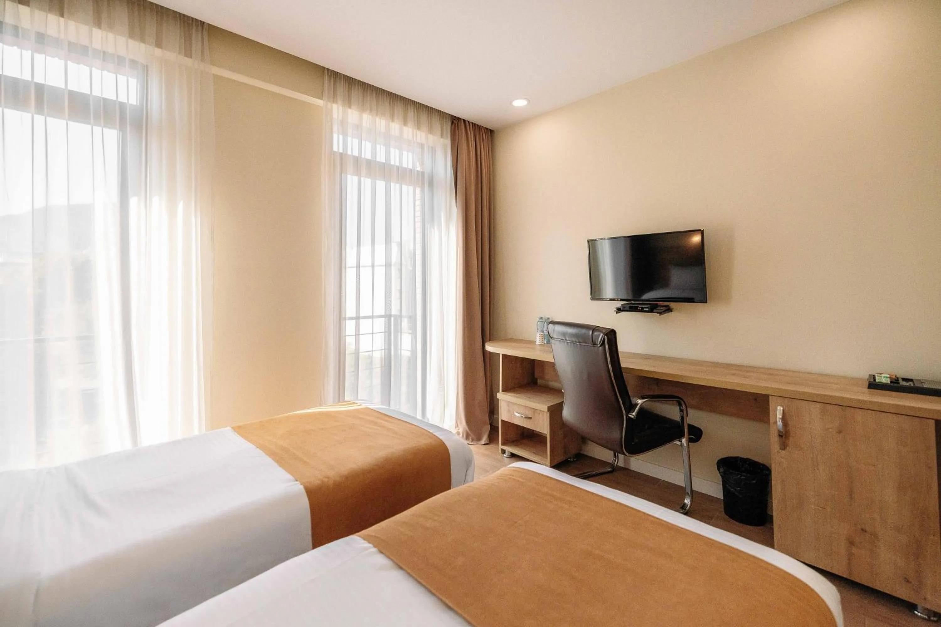 Bed in Atrium Boutique Hotel