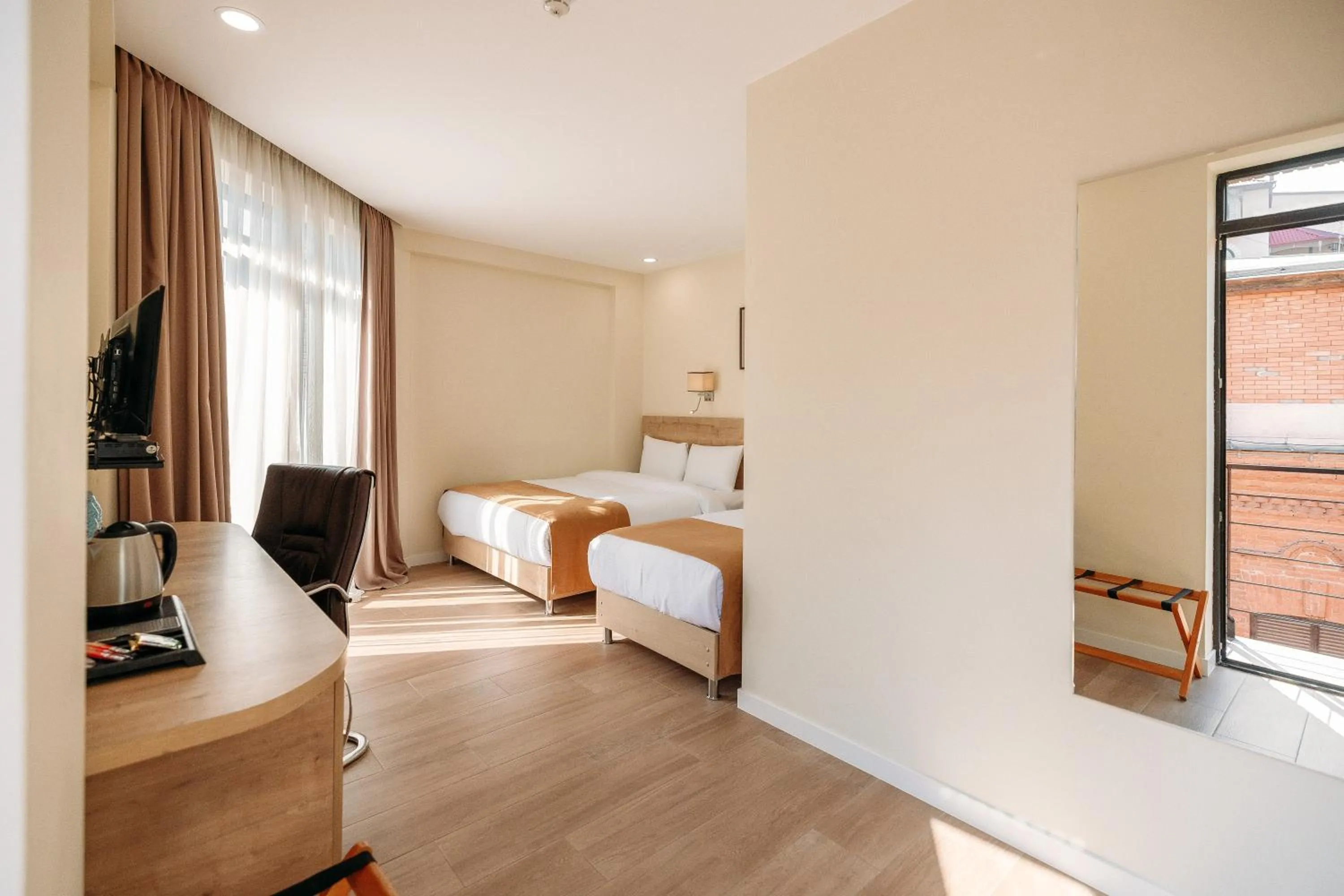 Bed in Atrium Boutique Hotel