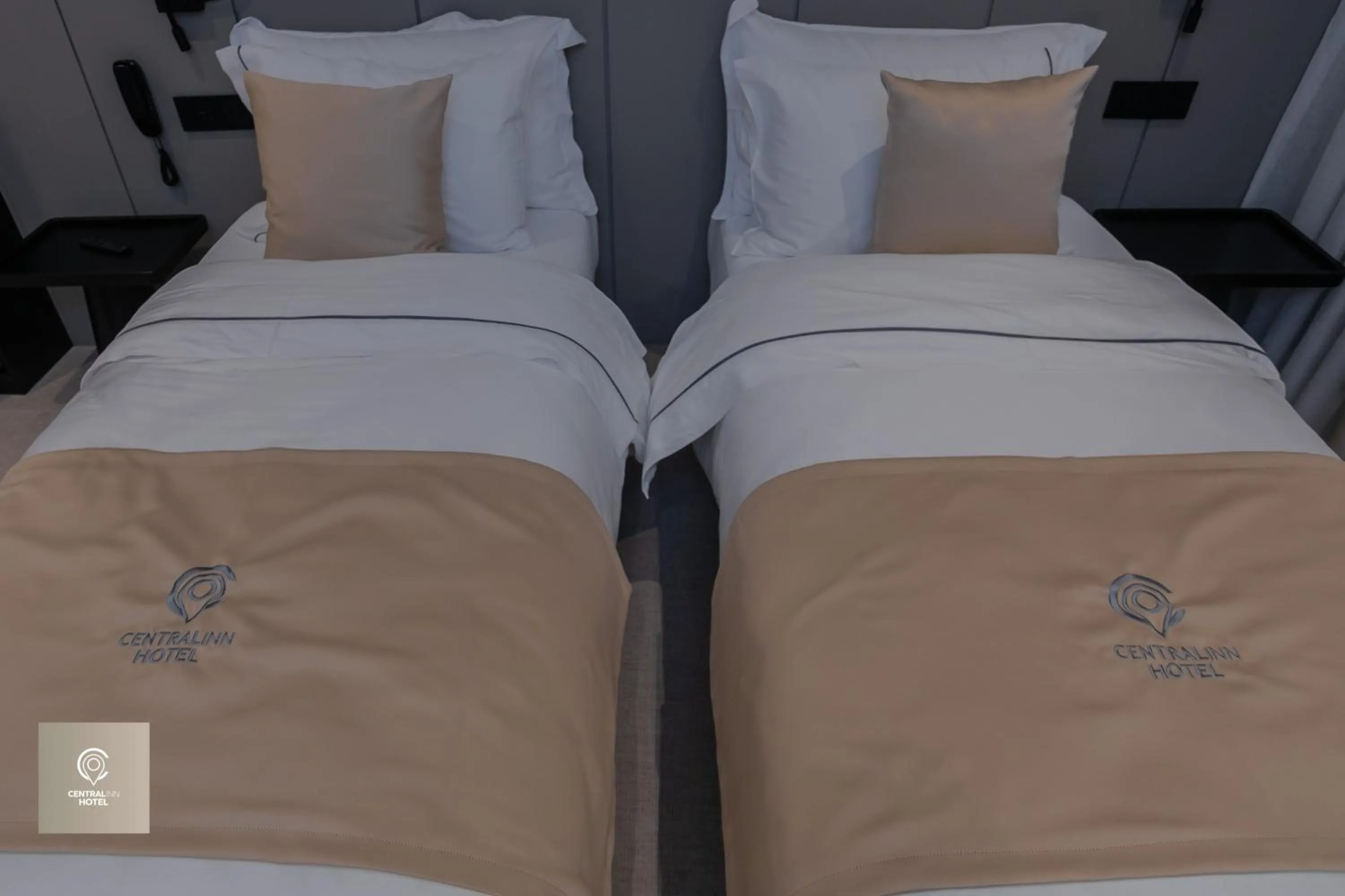 Bed in Central Inn Hotel