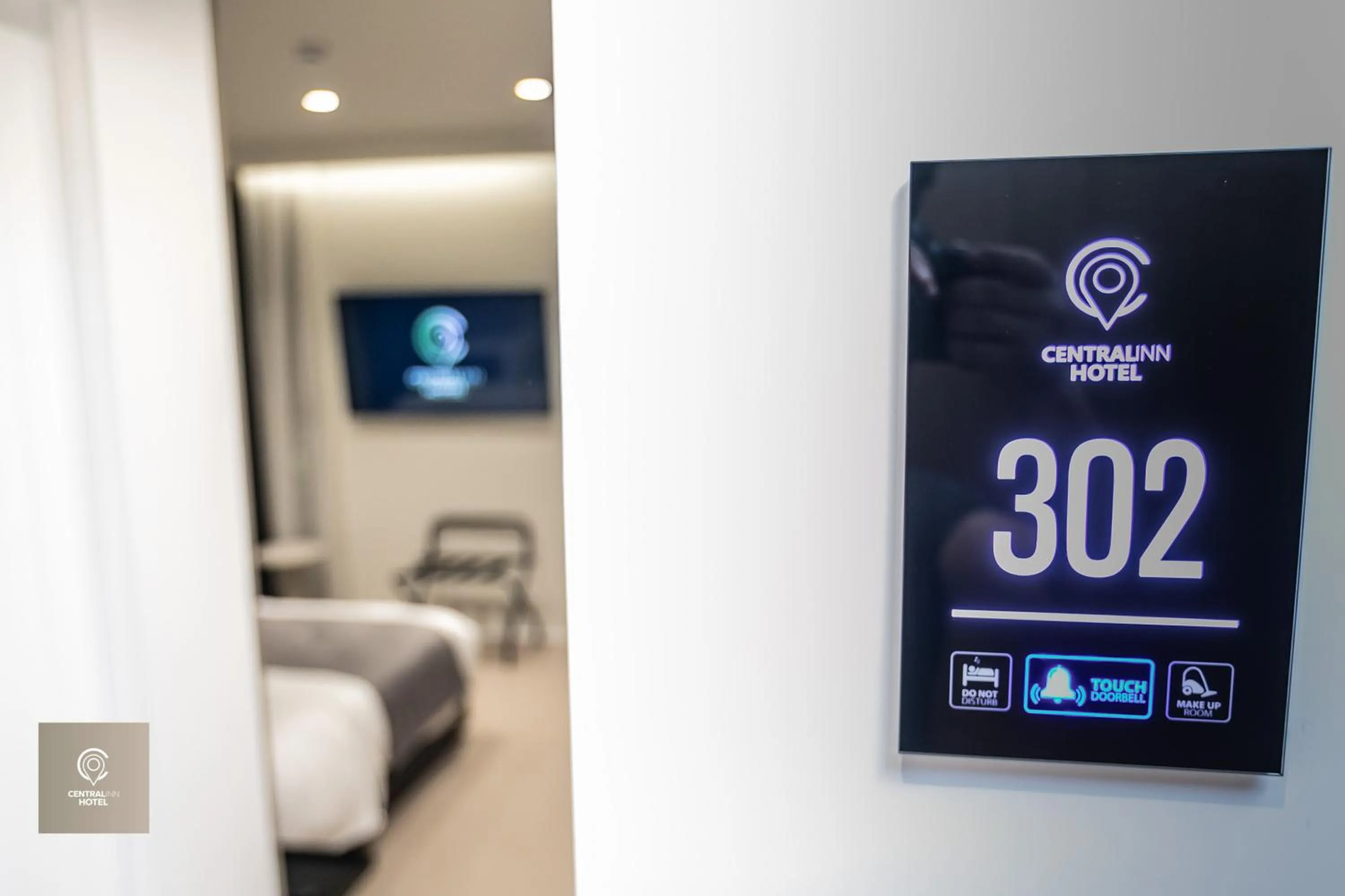 Bed in Central Inn Hotel