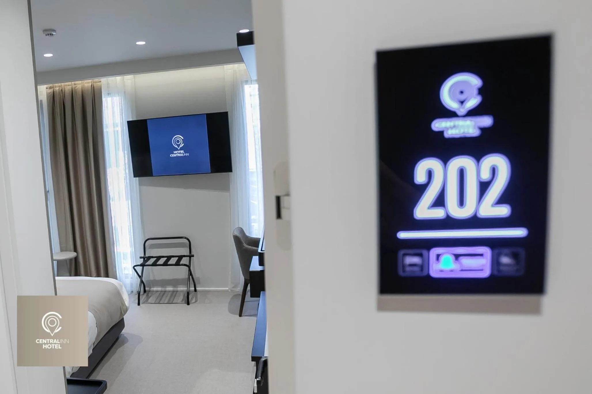 Bed in Central Inn Hotel