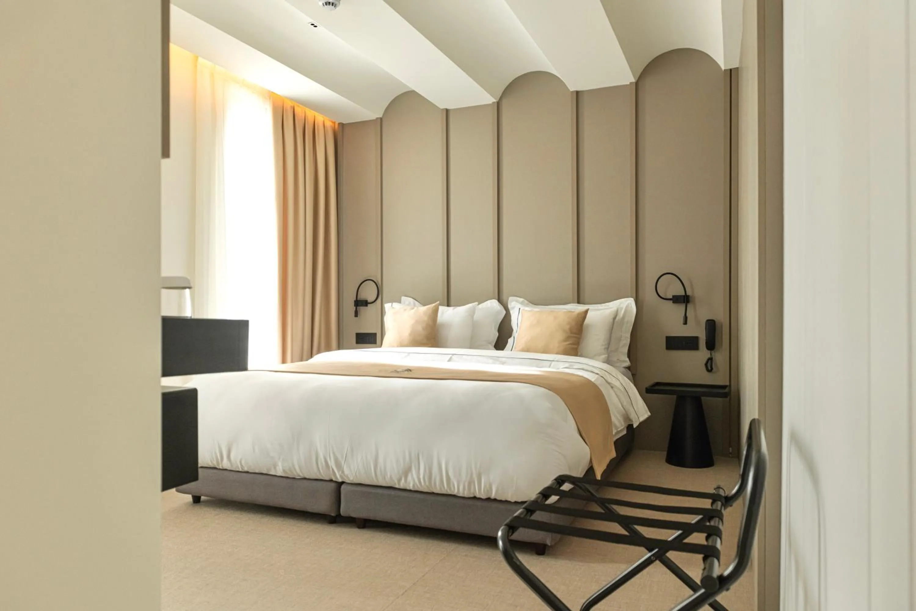 Bed in Central Inn Hotel