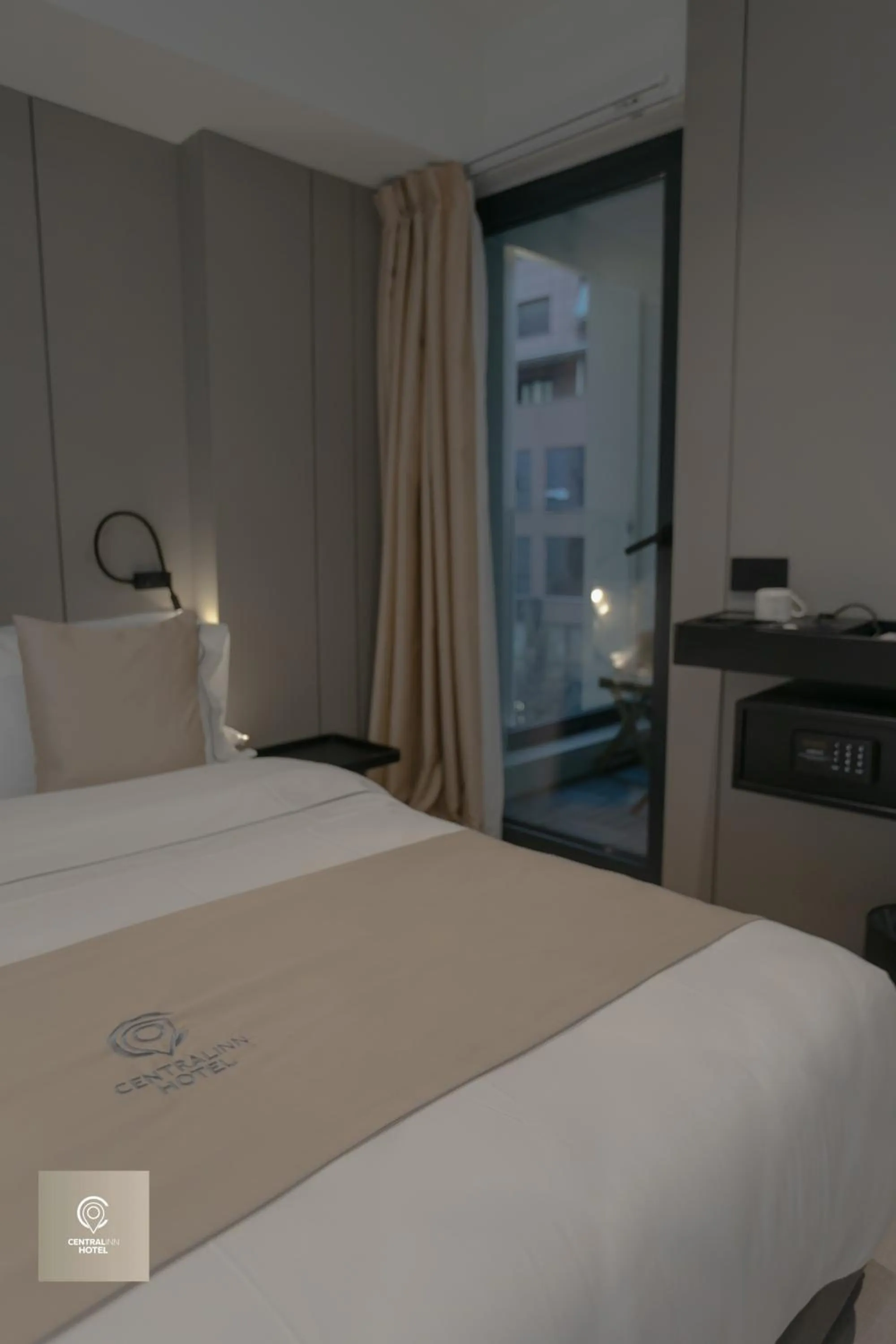 Bed in Central Inn Hotel