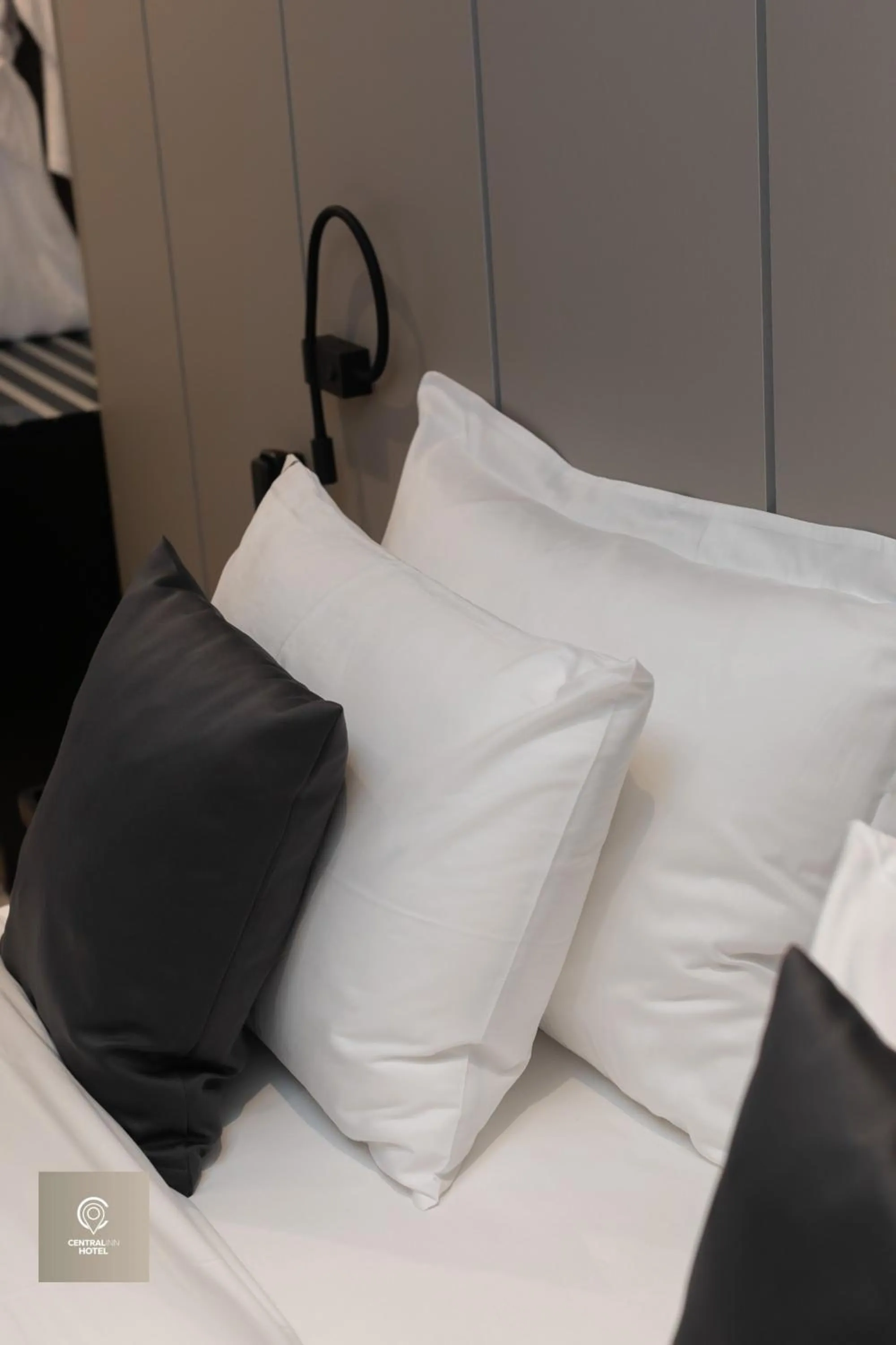 Bed in Central Inn Hotel