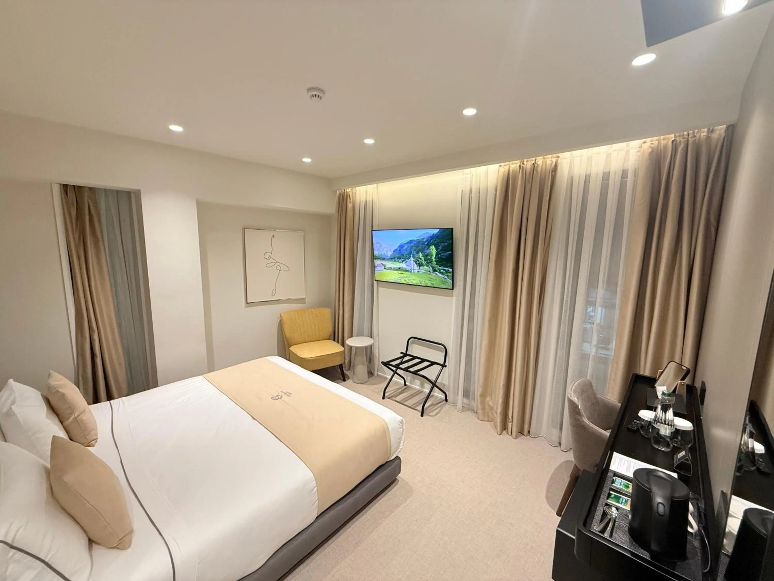 Bed in Central Inn Hotel