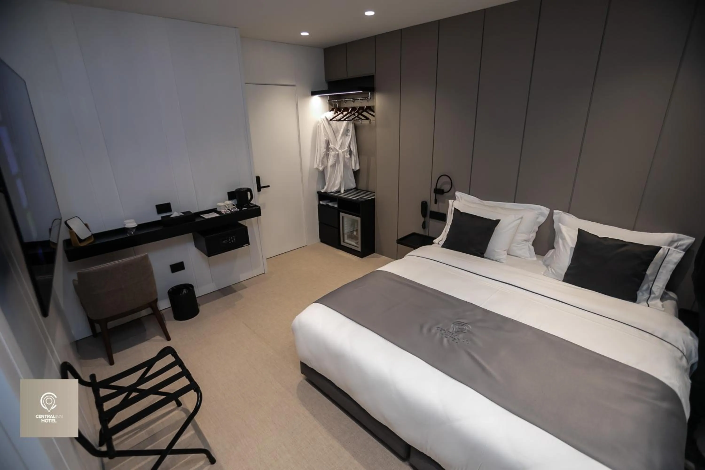 Bed in Central Inn Hotel