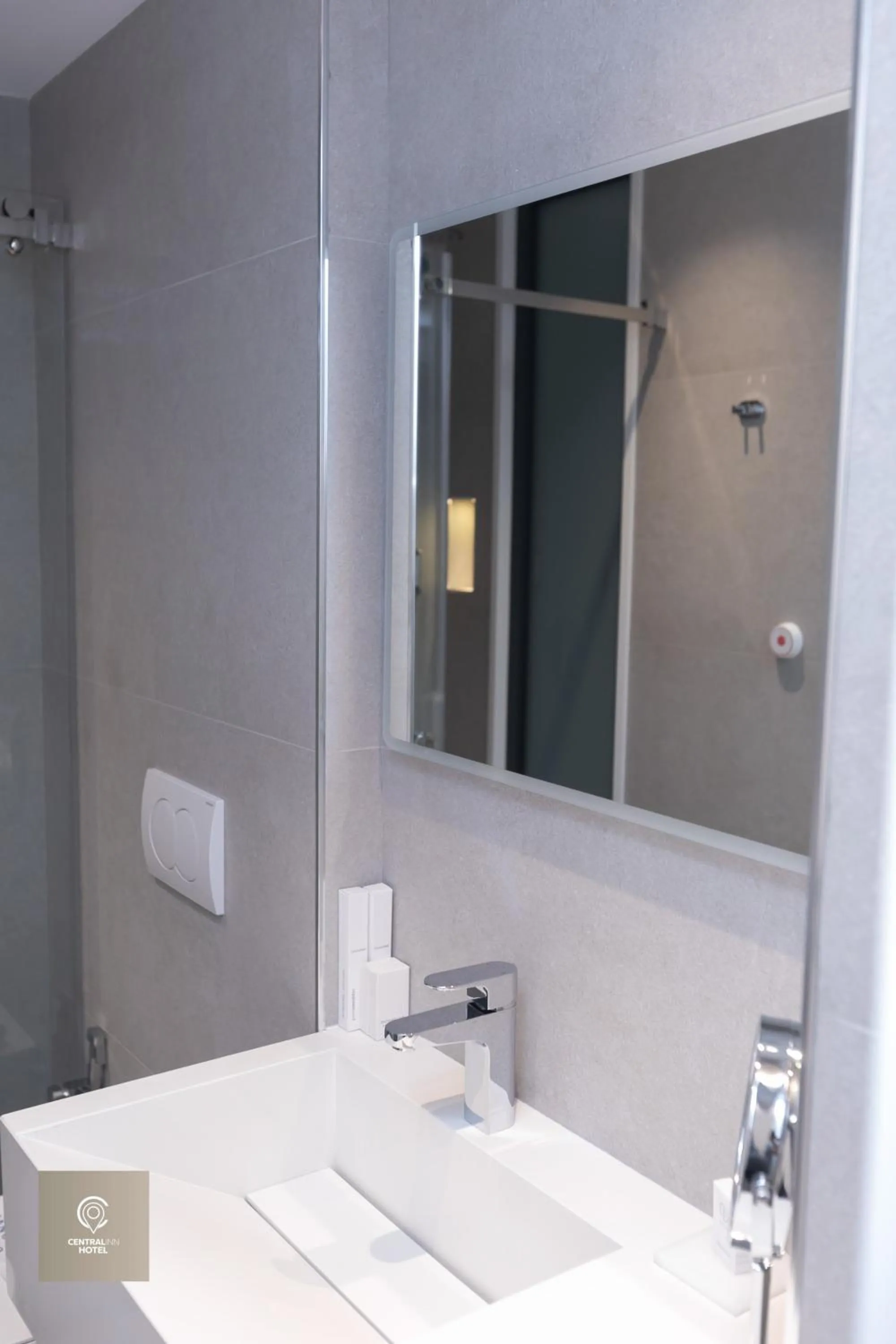 Bed in Central Inn Hotel