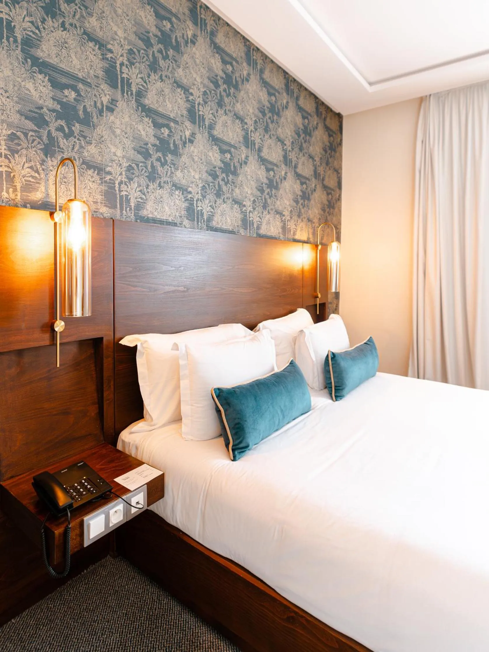 Bed in Fourteen Hotel Ain Sebaa