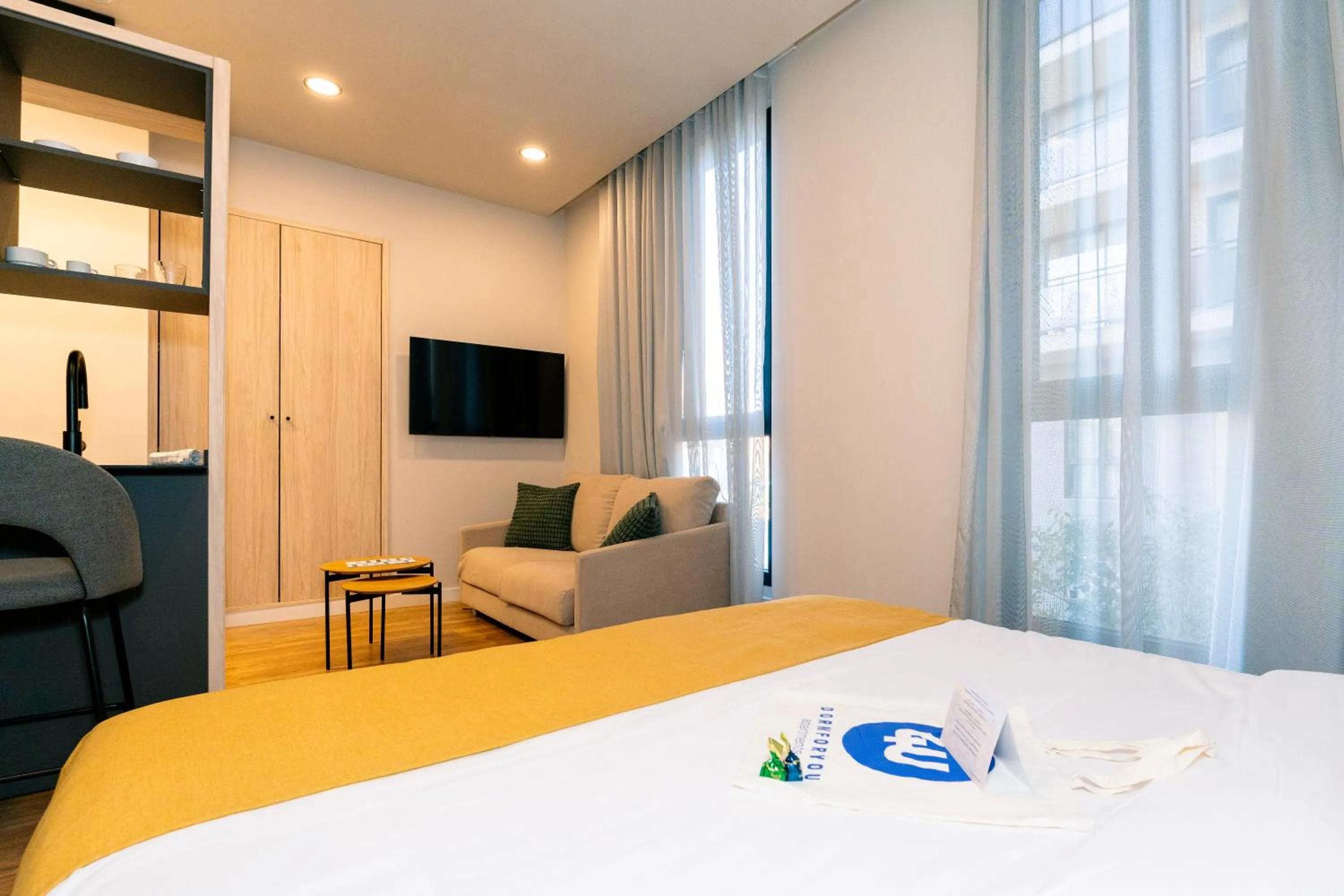 Communal lounge/ TV room, Bed in Dorm4You Arena 2