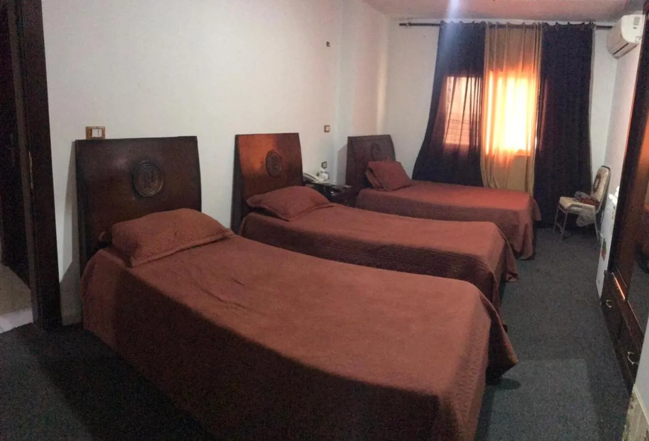 Bed in Alfares Hotel