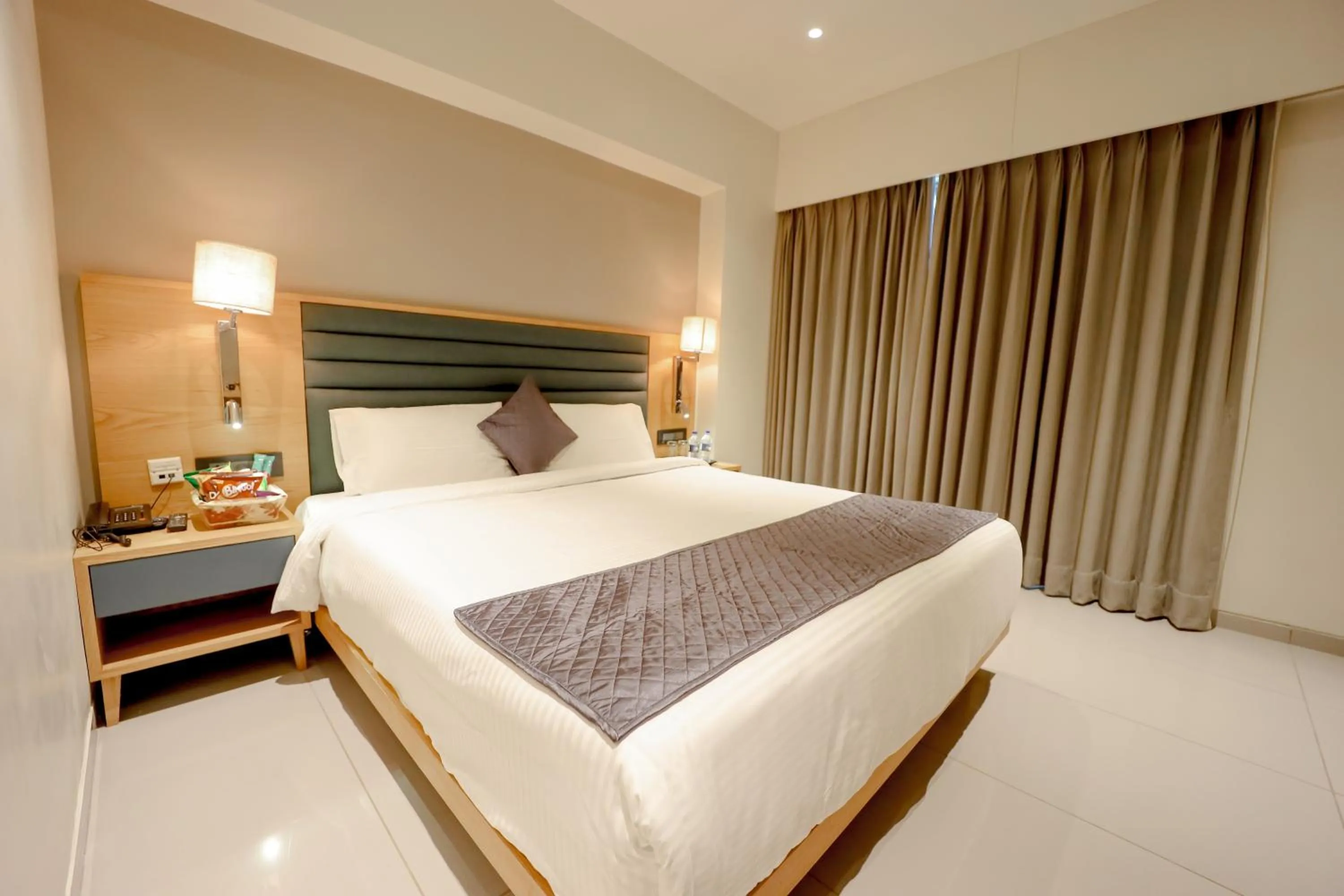 Bed in Pride Resort Ambaji