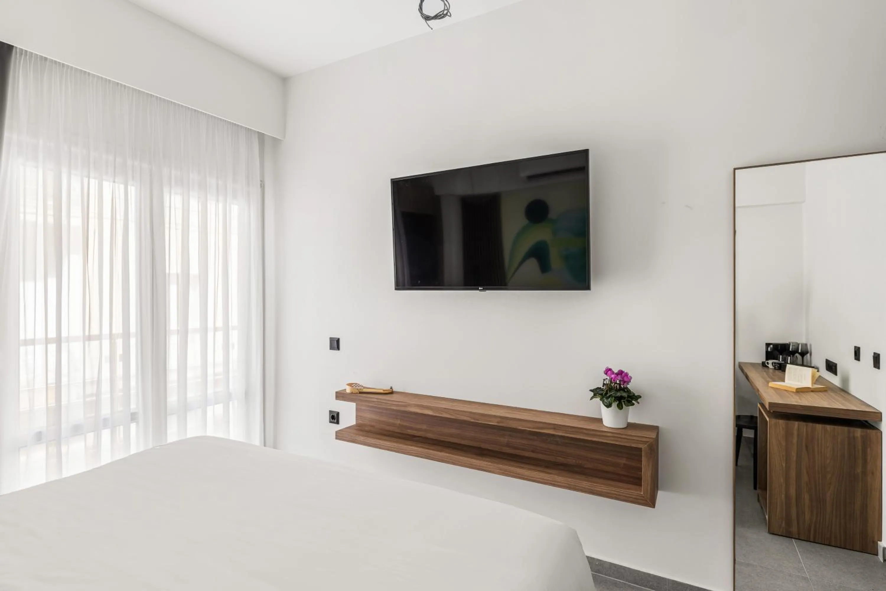 TV and multimedia, Bed in The Q Hotel