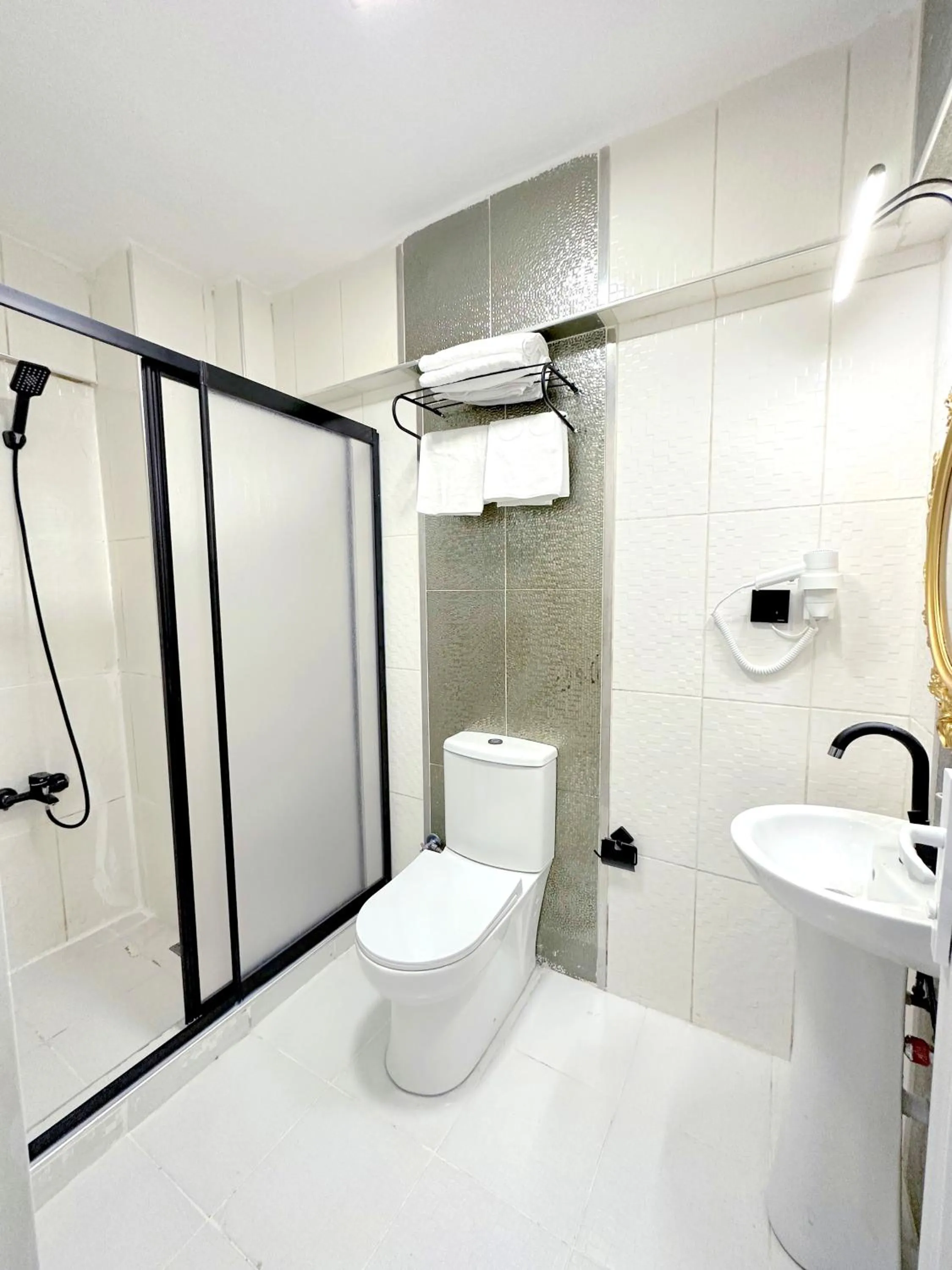 Shower in Menesa Hotel