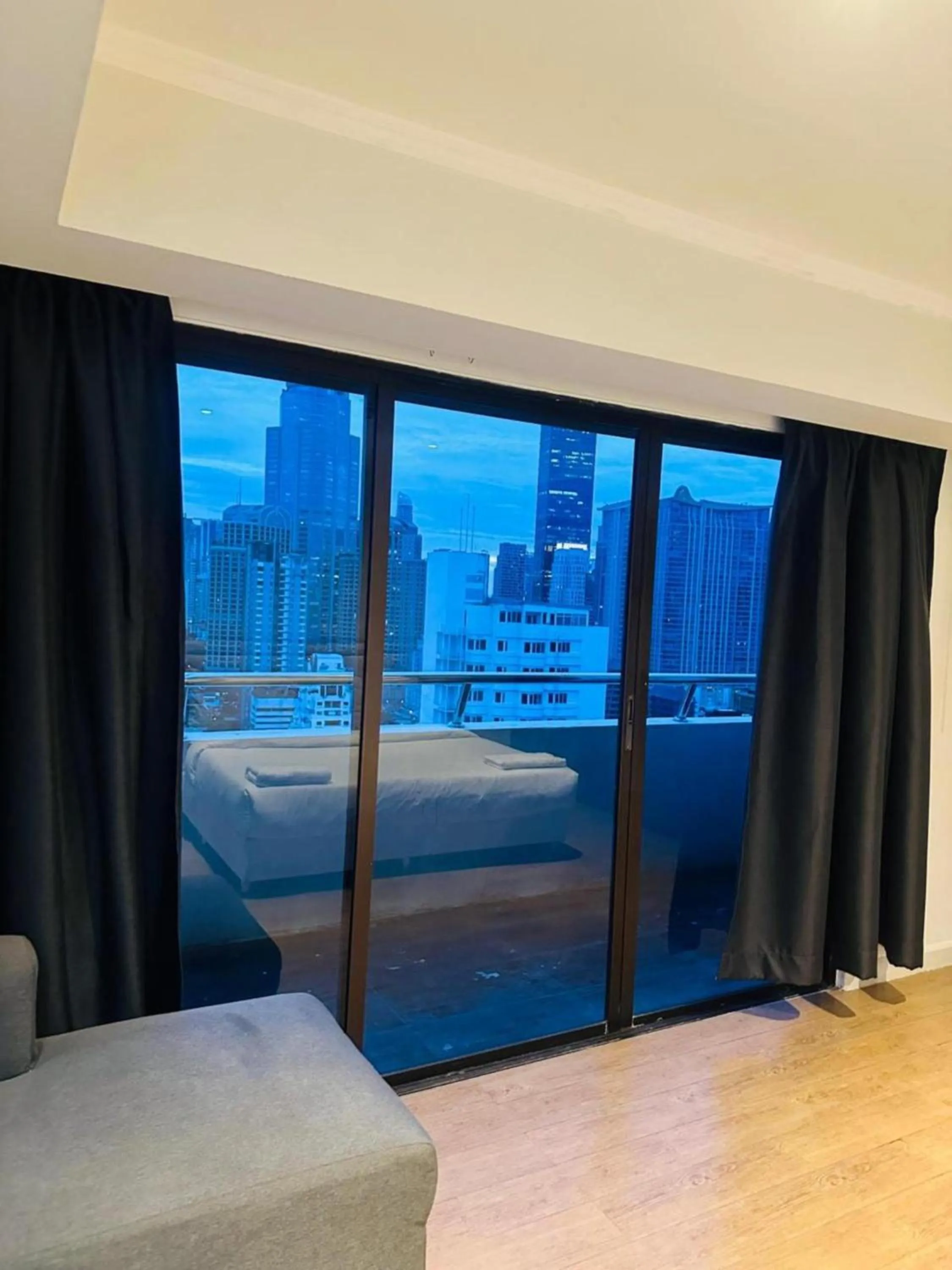 Balcony/Terrace, Bed in Omni Tower Cozy Apartments by Direct Rooms