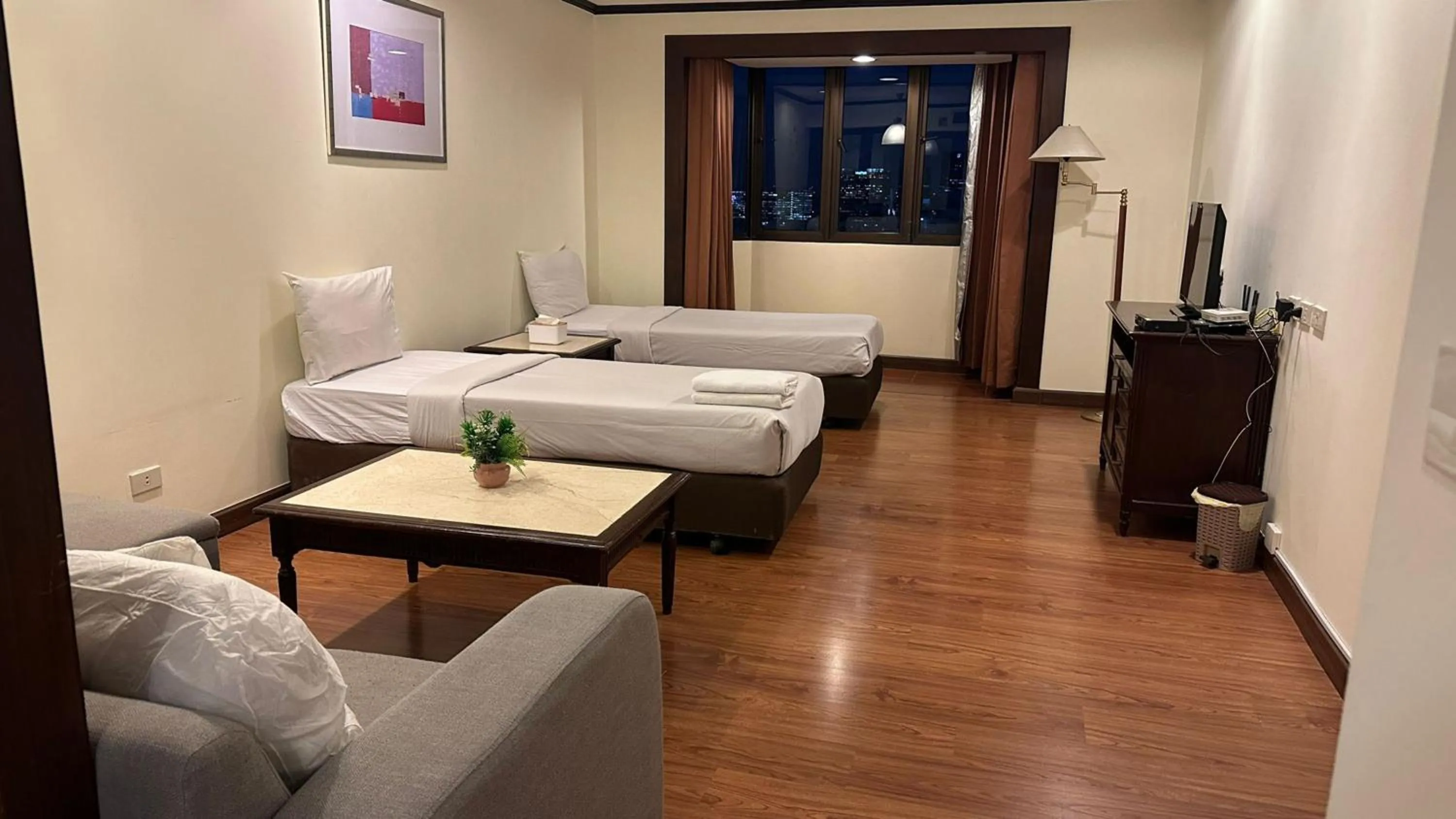 Living room, Bed in Omni Tower Cozy Apartments by Direct Rooms