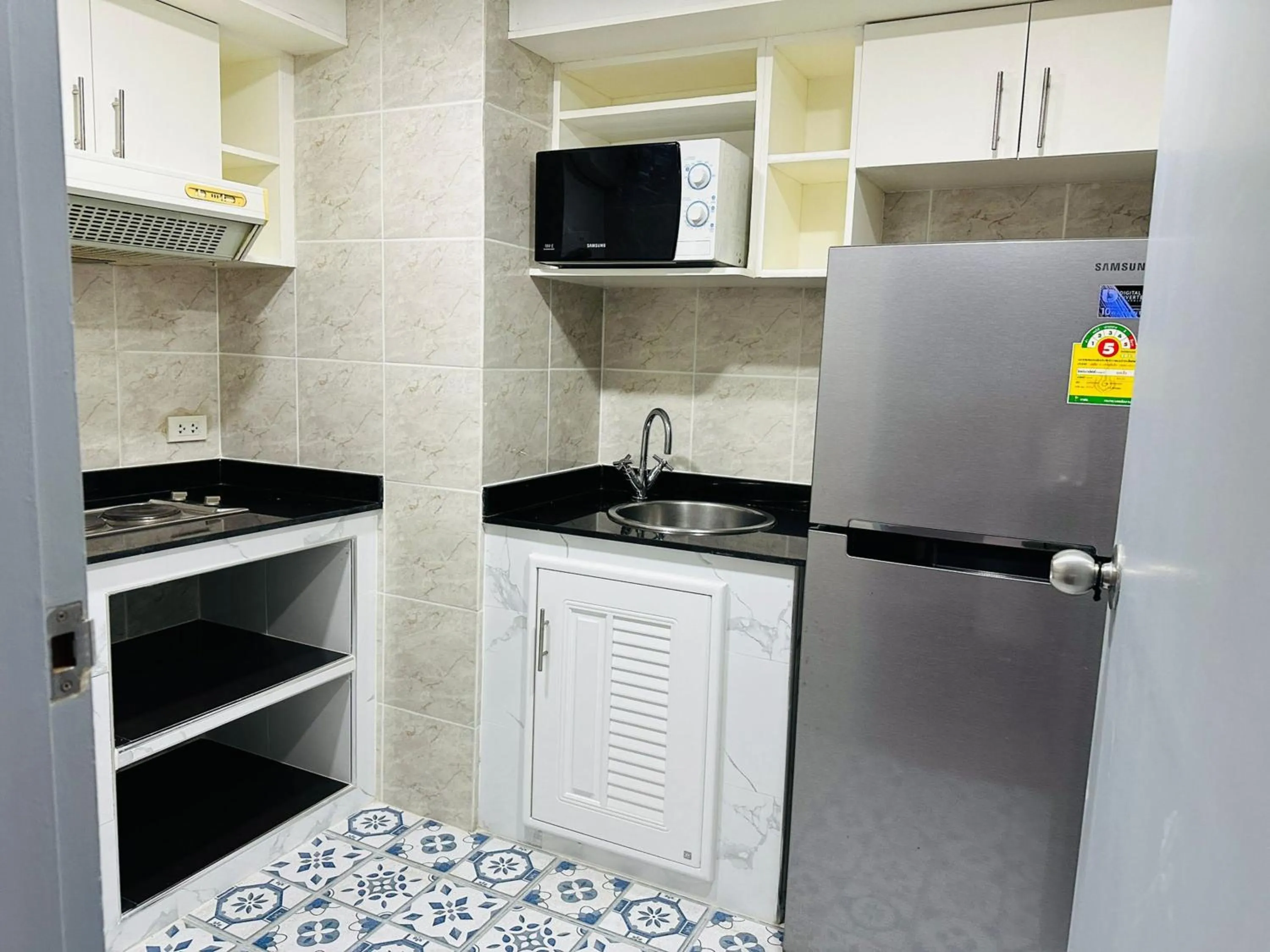Kitchen or kitchenette in Omni Tower Cozy Apartments by Direct Rooms