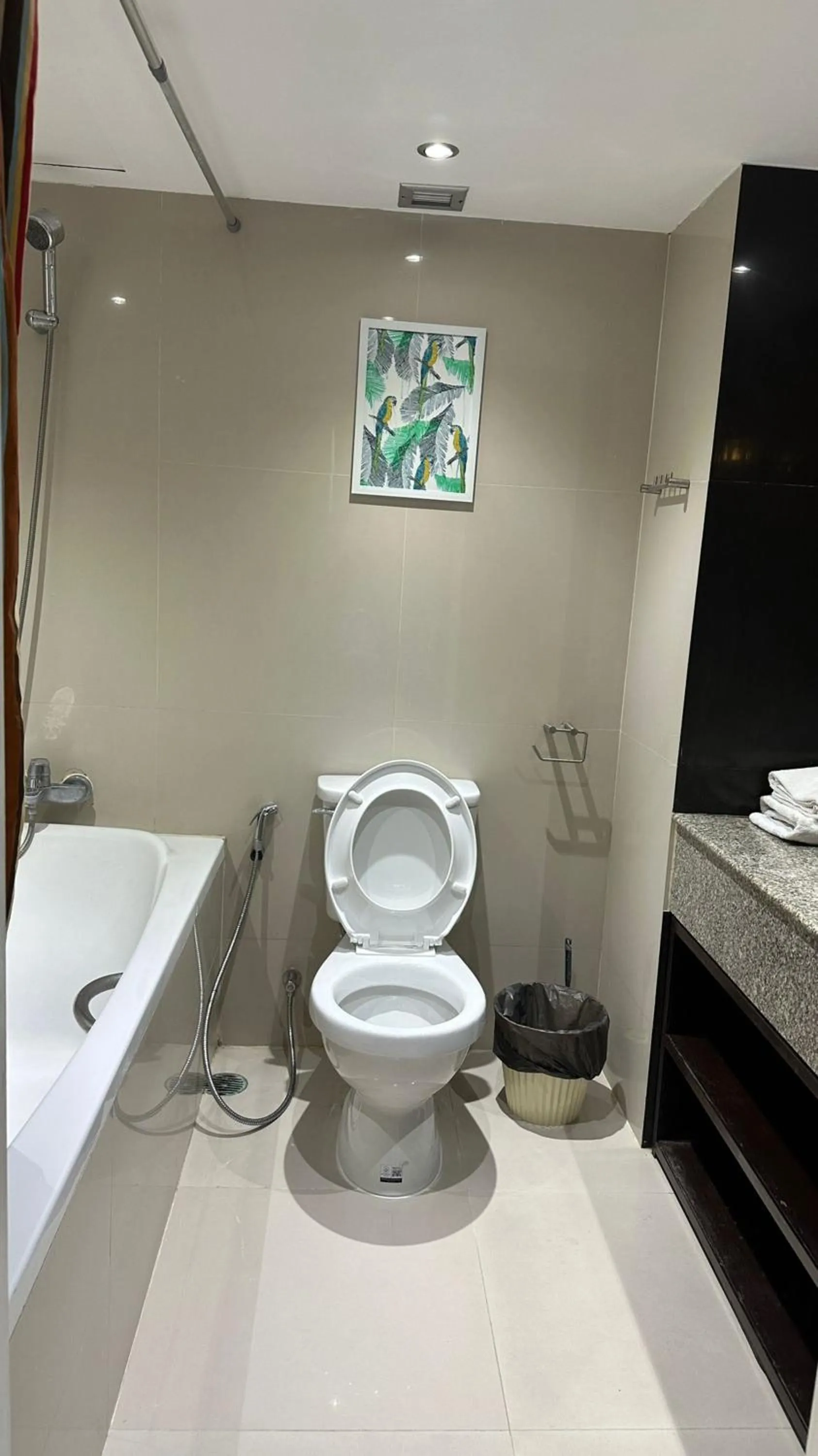 Toilet in Omni Tower Cozy Apartments by Direct Rooms